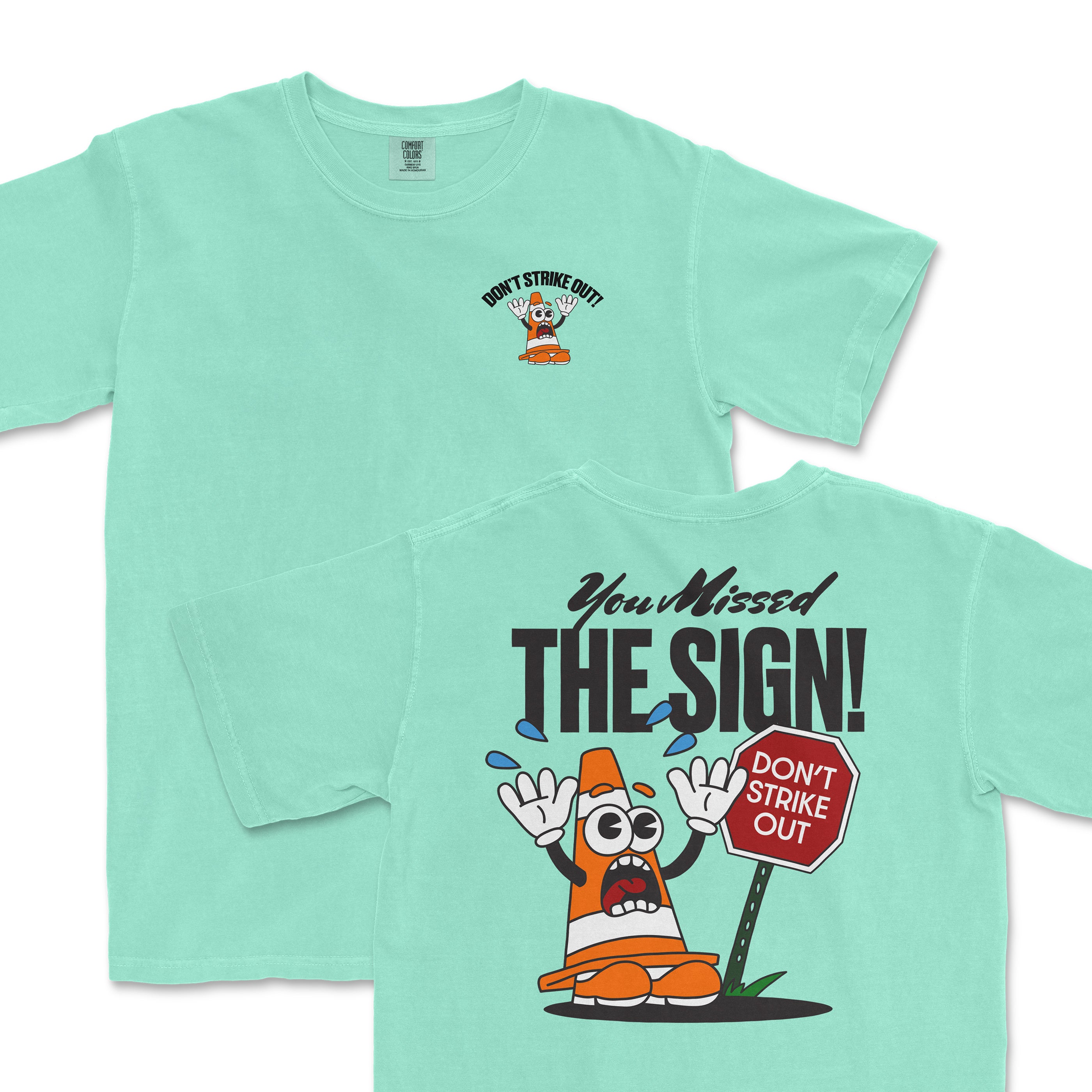 Mint green t-shirt featuring a playful traffic cone graphic with the text "You Missed THE SIGN! Don't Strike Out!