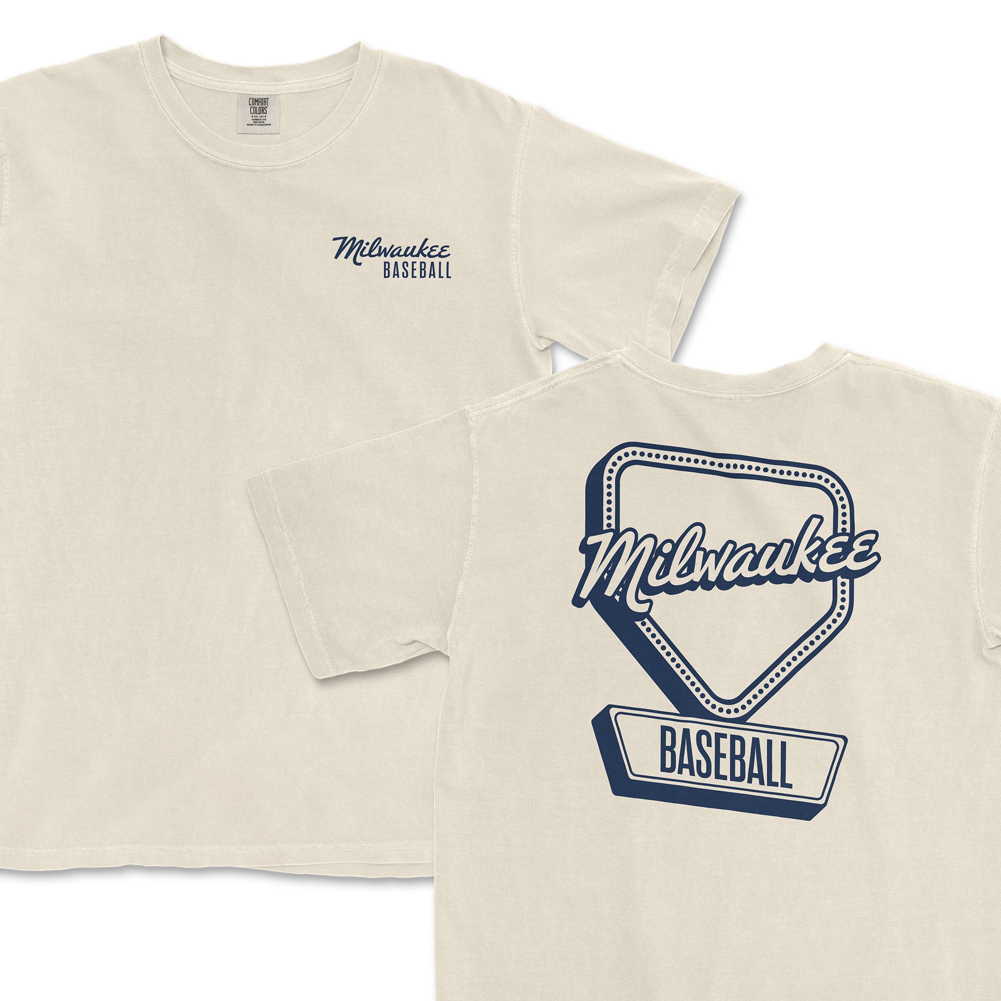 Cream-colored t-shirt featuring "Milwaukee Baseball" logo on the front and a diamond-shaped design on the back.