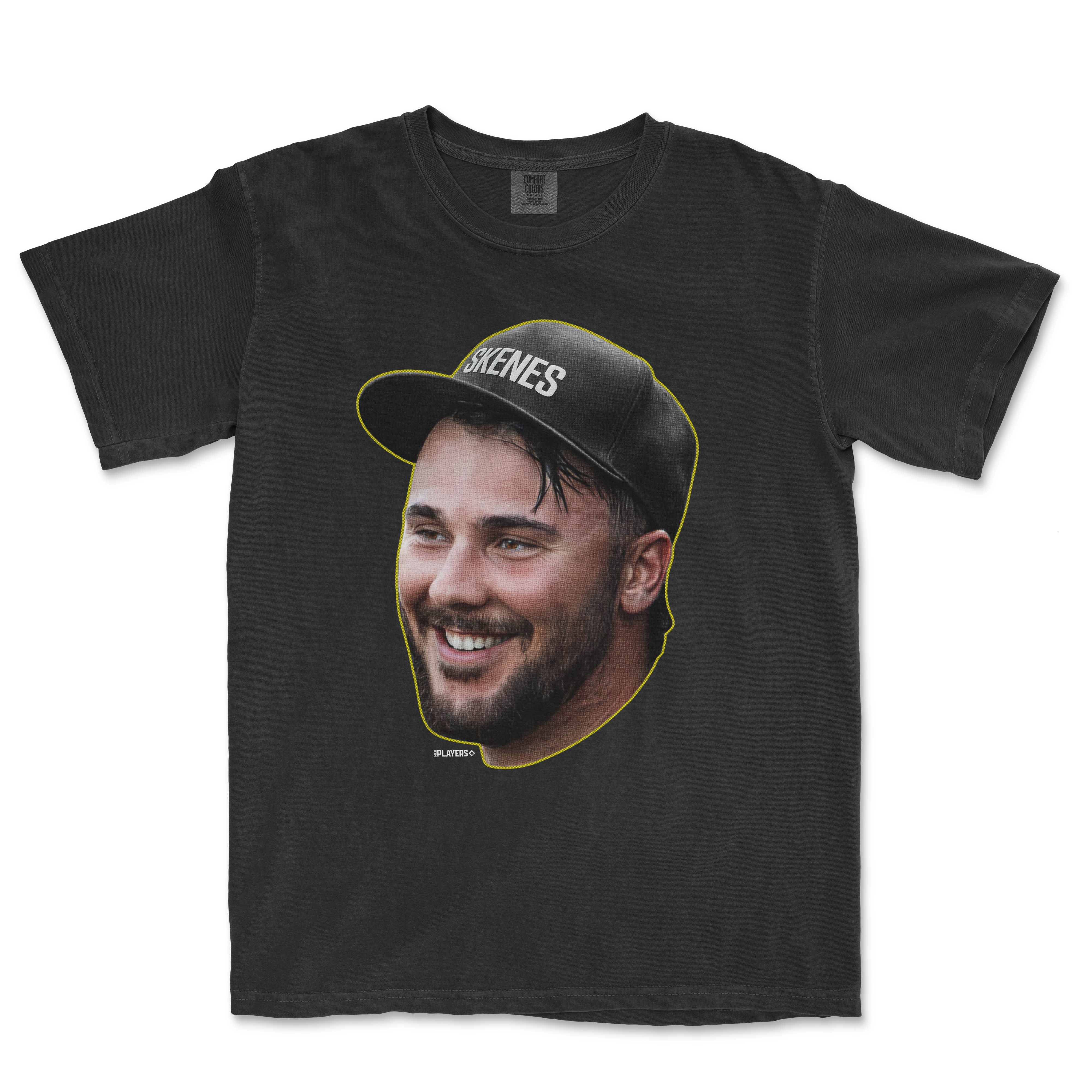 Black t-shirt featuring a smiling graphic of Paul Skenes with a cap, part of the Head in the Game Series.