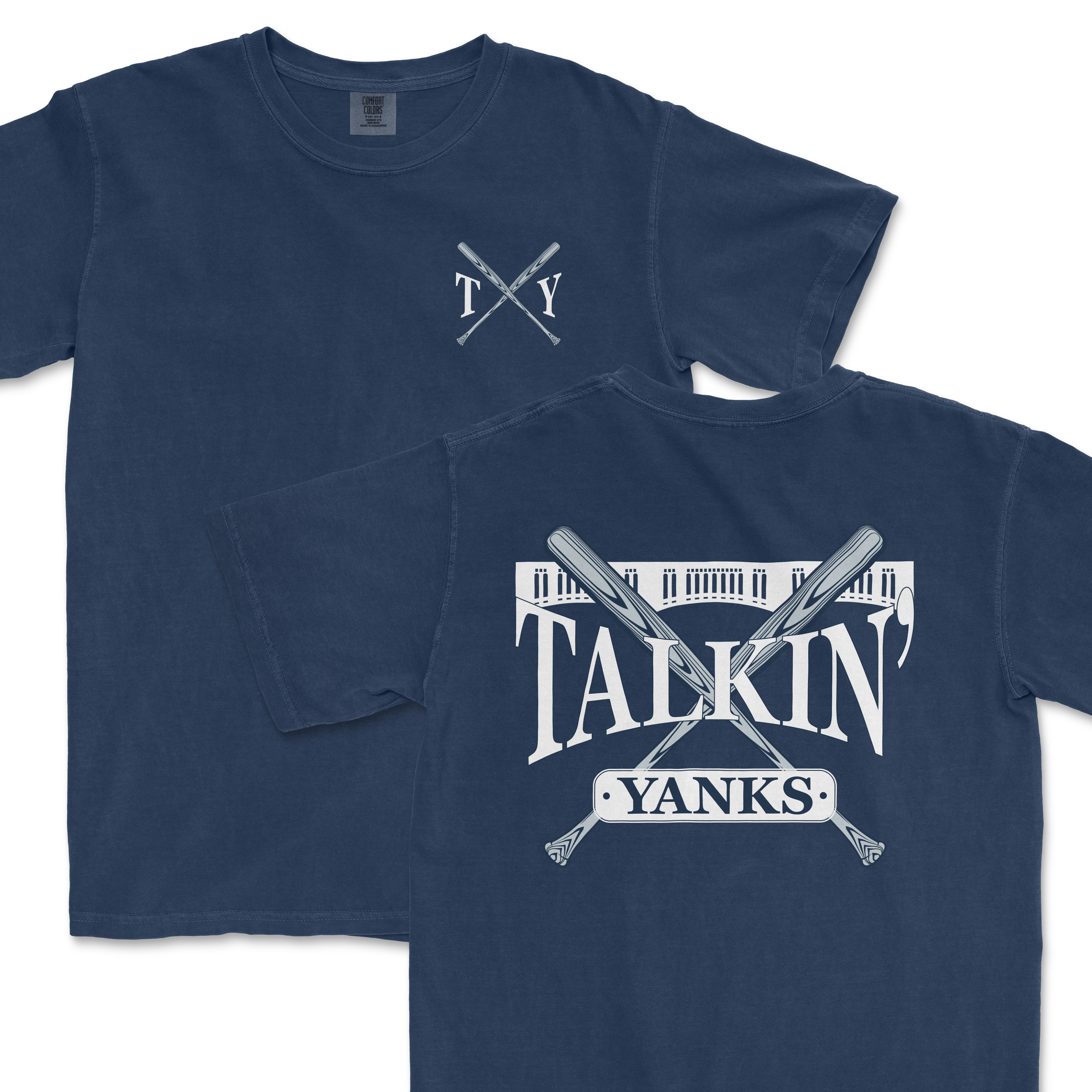 Navy blue Comfort Colors t-shirts featuring '97 Inspired Talkin' Yanks design with crossed baseball bats and stadium illustration. One shirt displays a large graphic on the front while the other has a smaller logo on the left chest area.