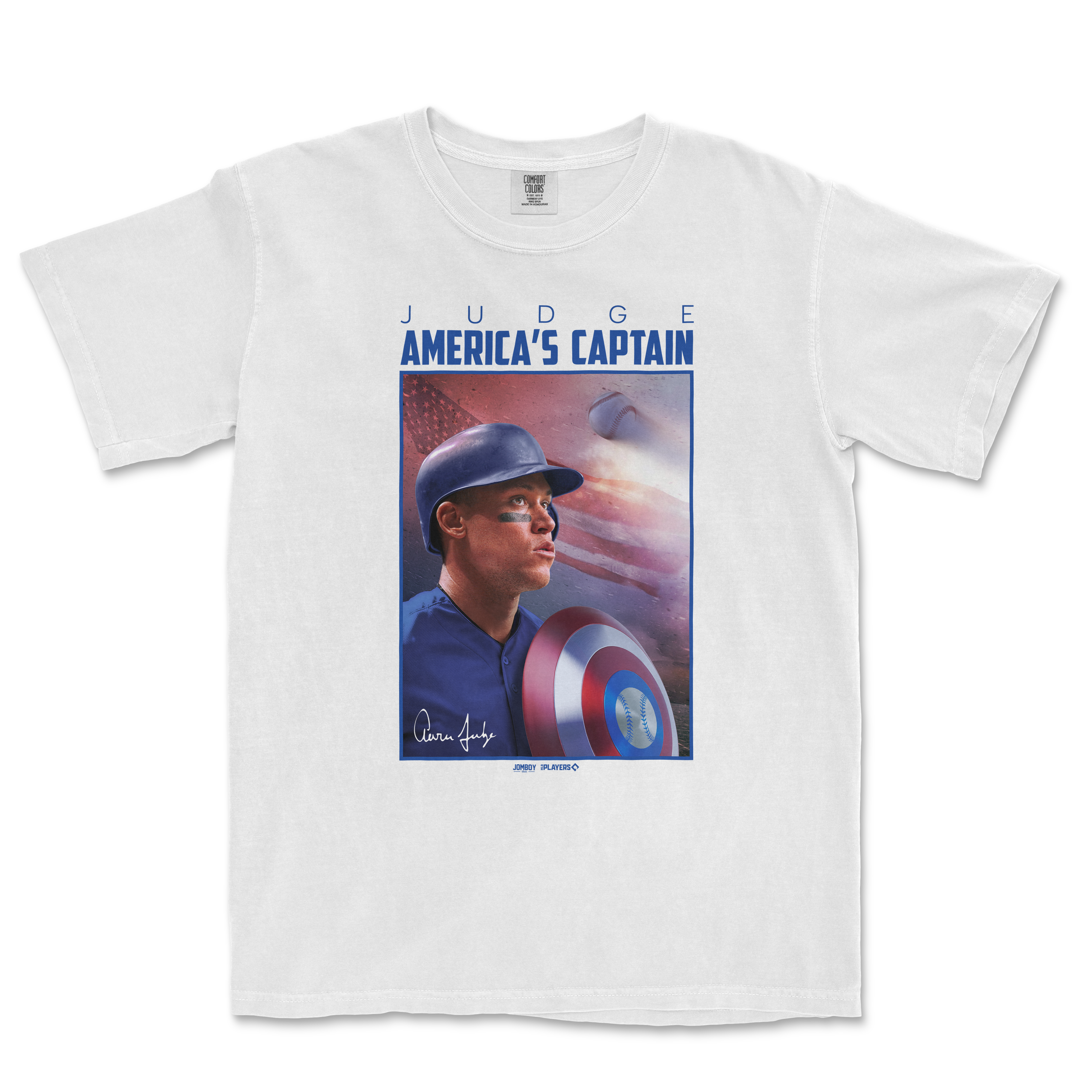 White Comfort Colors T-shirt featuring a graphic of Aaron Judge as America's Captain, with a baseball, shield, and patriotic background.