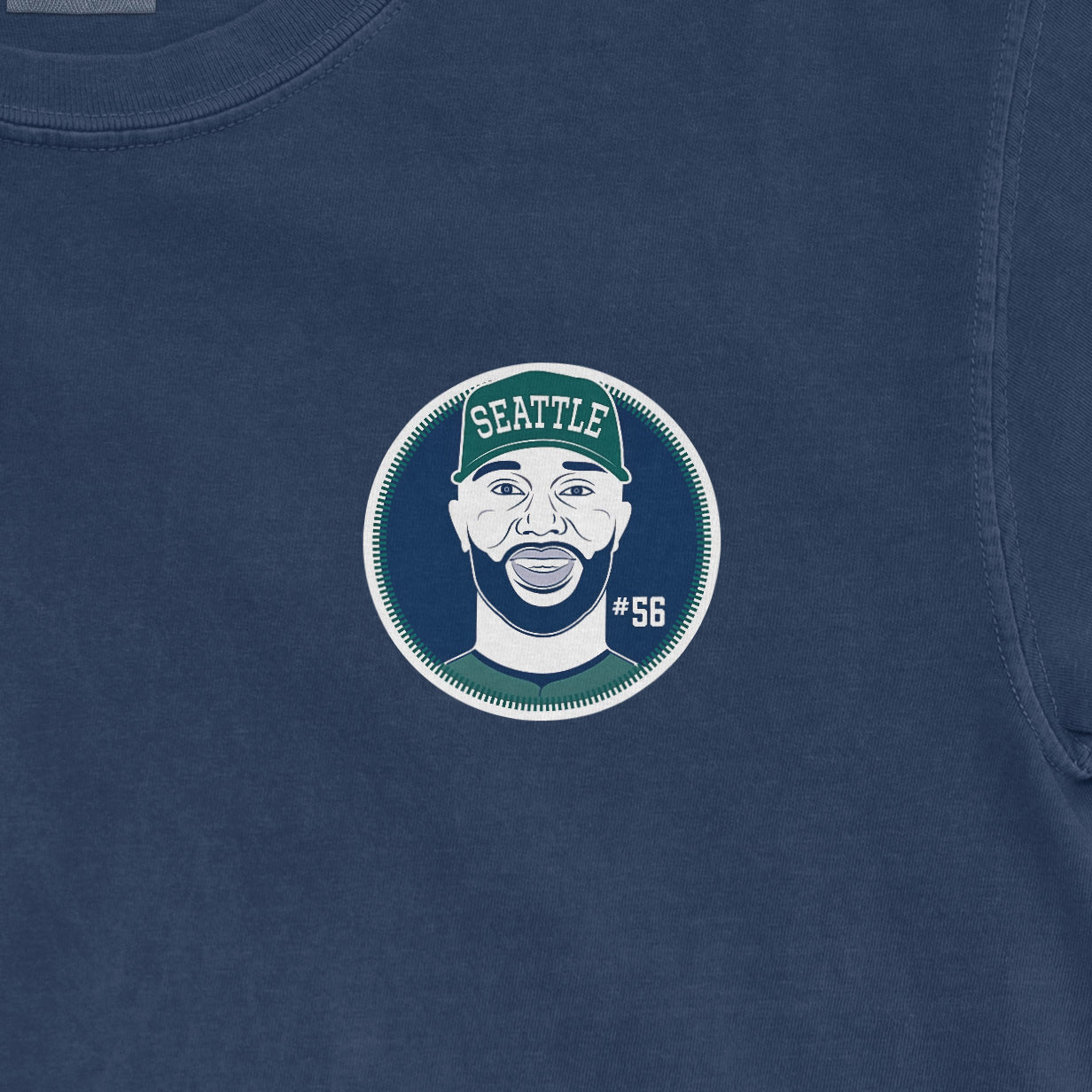 Blue Randy Arozarena shirsey with a Seattle-themed graphic of a smiling man wearing a cap, #56, and the word "SEATTLE".
