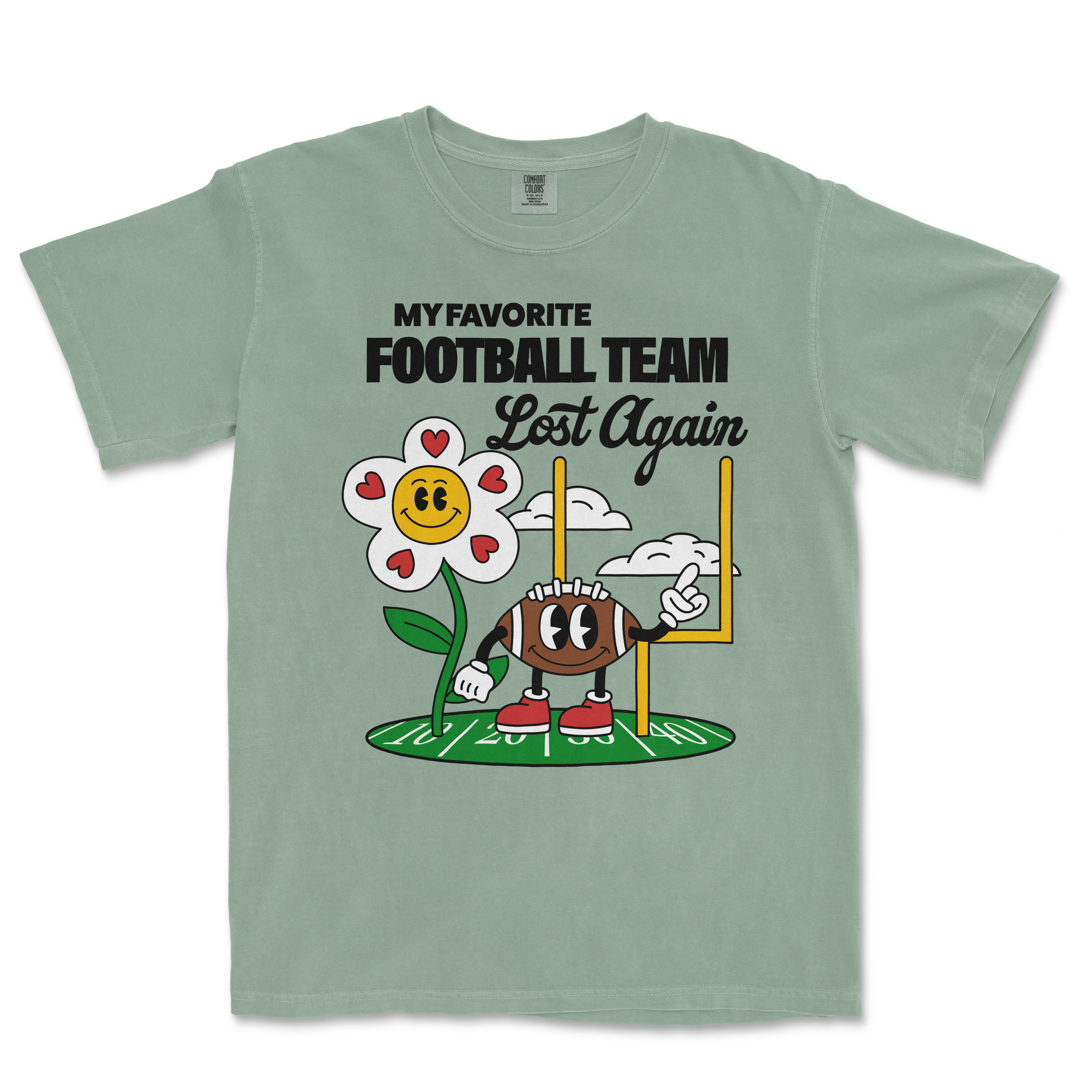 Light green Comfort Colors T-shirt with a playful football-themed graphic and the text "My favorite football team lost again.