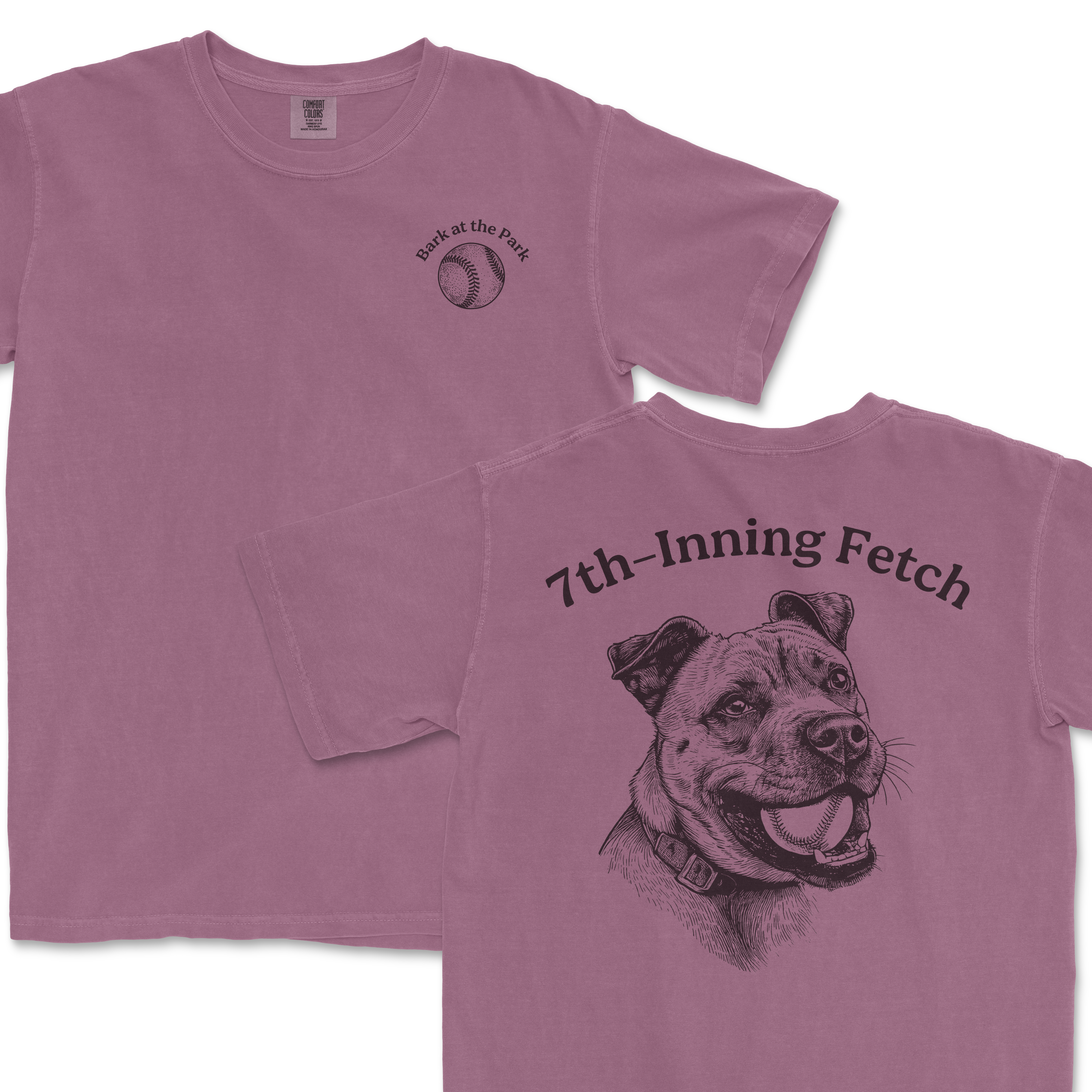 Pink Comfort Colors T-shirt featuring a front small baseball graphic with "Bark at the Park" text and back illustration of a happy pitbull with "7th-Inning Fetch" text.