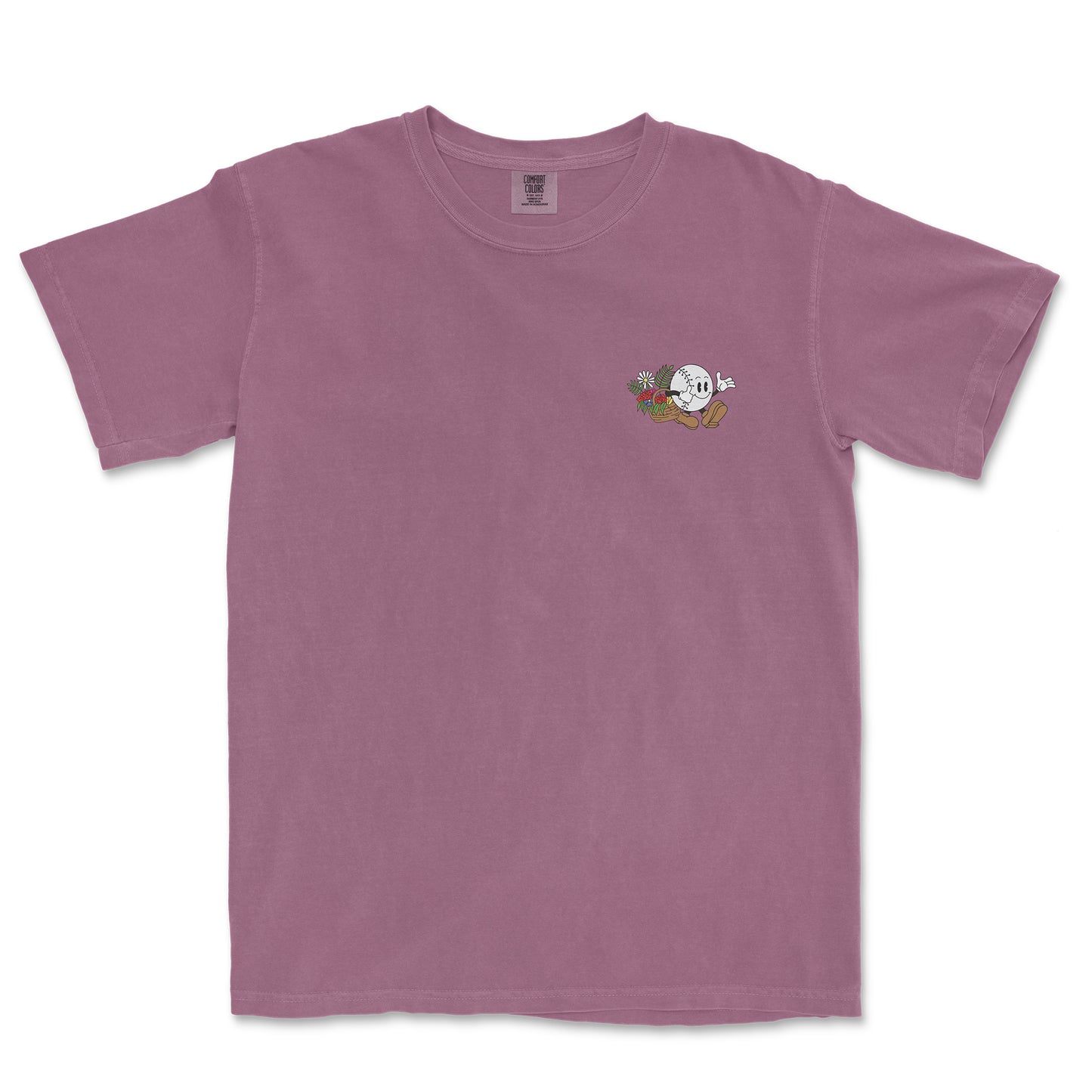 Pink Comfort Colors tee featuring a small baseball girl cartoon with flowers and a baseball glove on the chest.