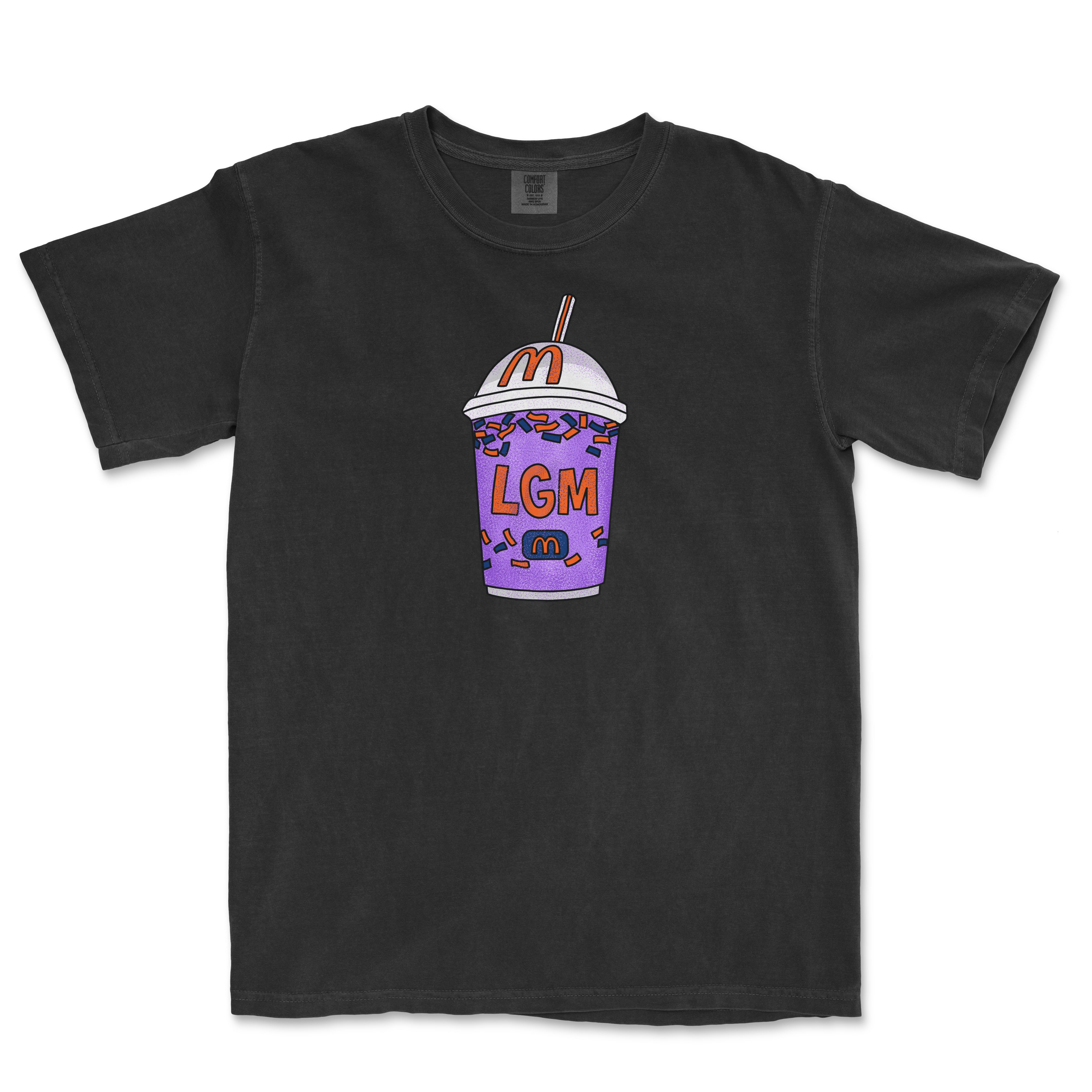 Black t-shirt featuring a colorful, cartoon-style milkshake with sprinkles, a straw, and "LGM" text on the cup.
