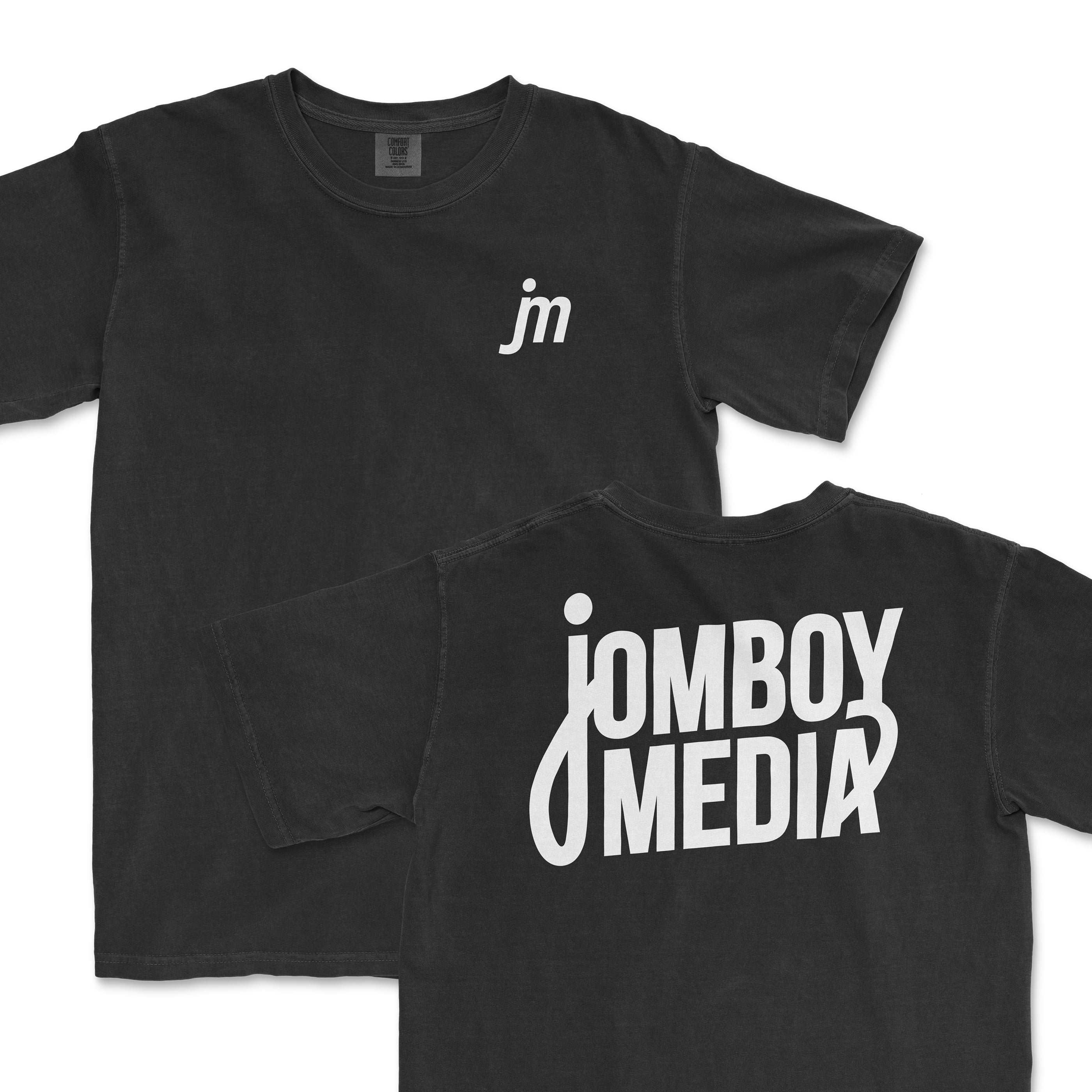 Black JM Essentials '25 Logo Tee featuring a small logo on the front and bold "jomboy media" text on the back.