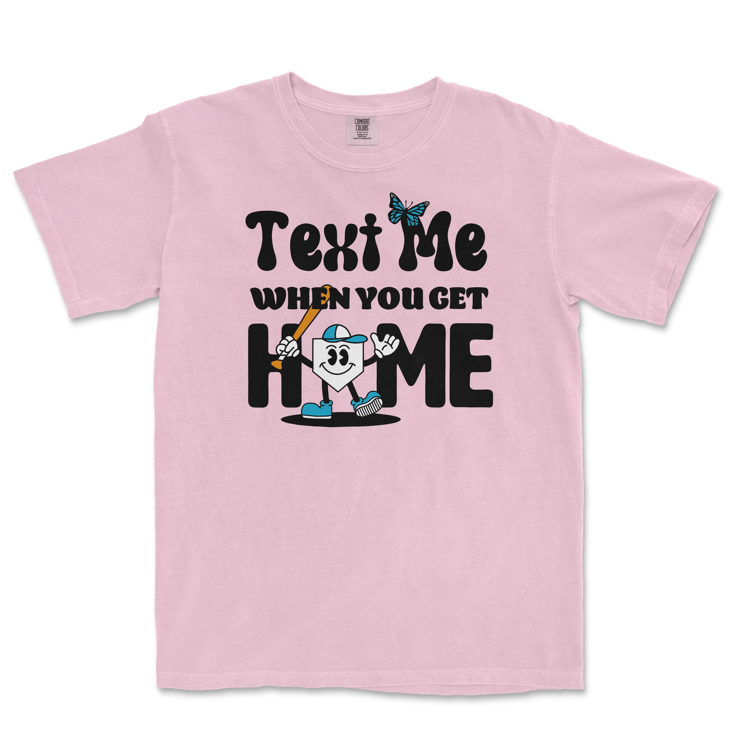 Pink T-shirt with a cartoon character holding a baseball bat, surrounded by playful text that reads "Text me when you get home.