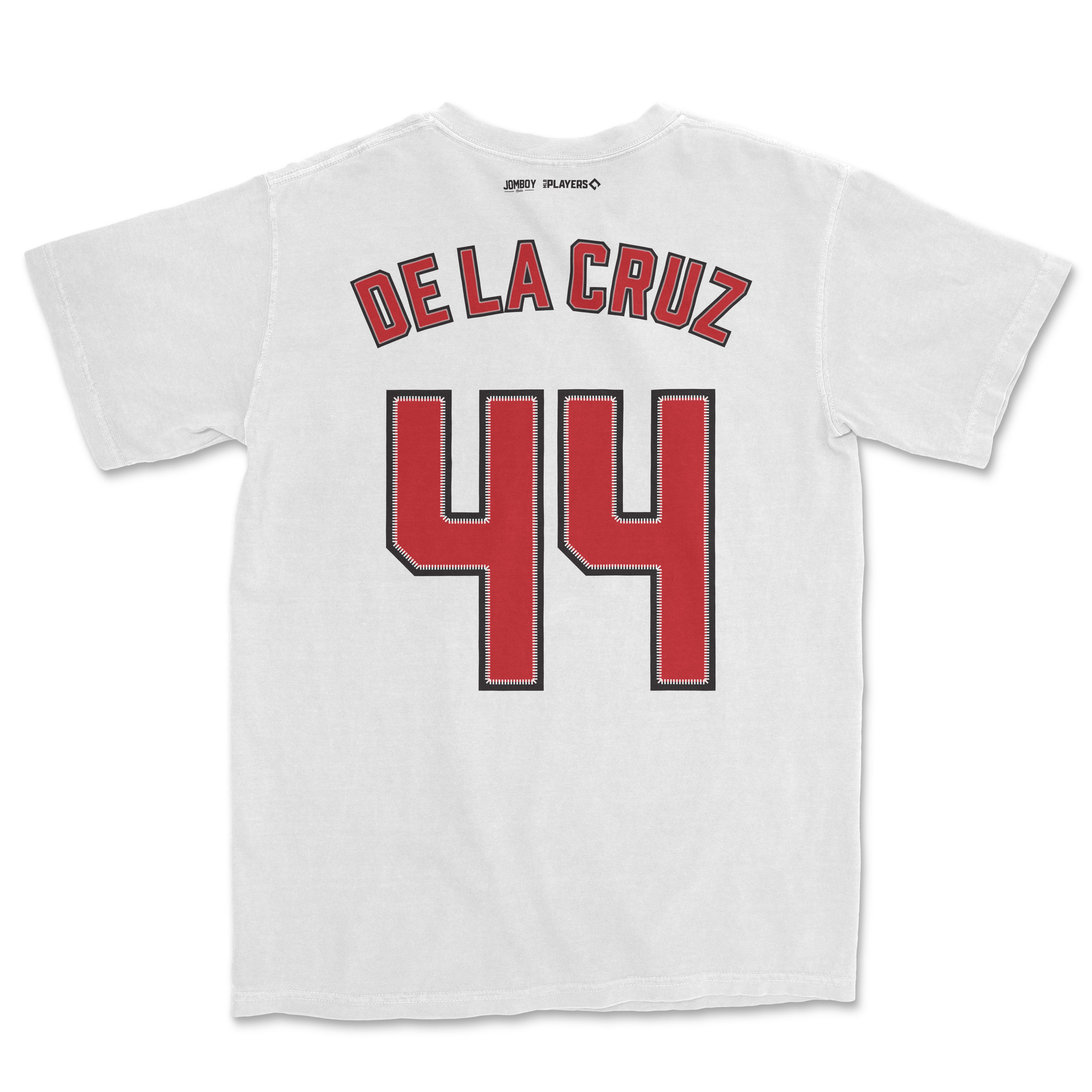 White Comfort Colors T-shirt featuring "De La Cruz" and the number 44 in red and black, with small logos at the back neckline.