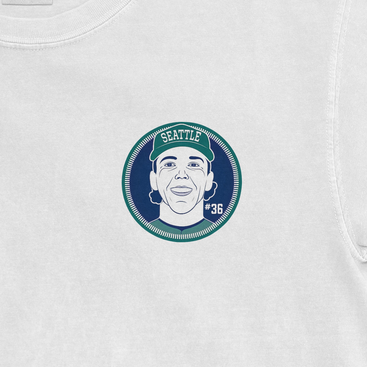 Logan Gilbert caricature graphic on a Comfort Colors tee, featuring a Seattle-themed design with the number 36.