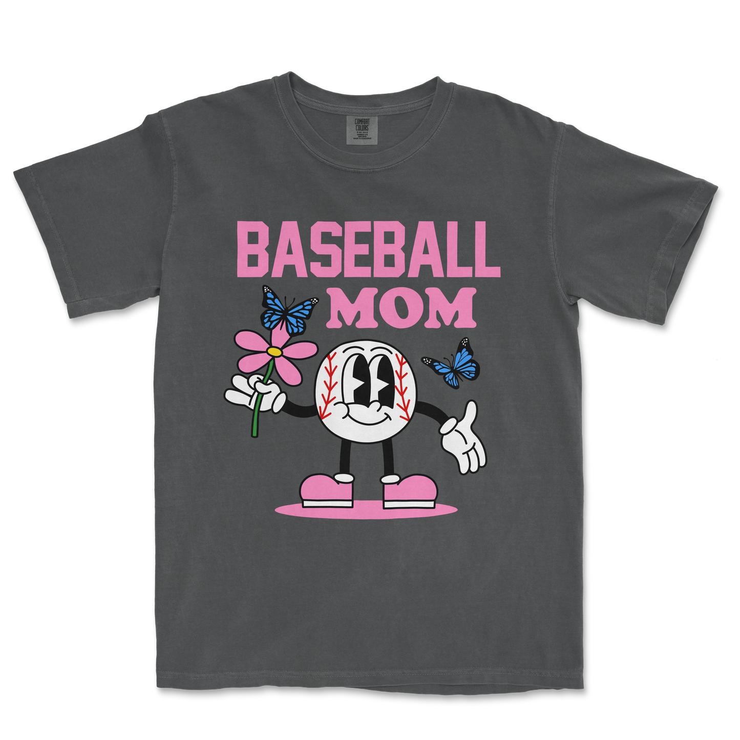 Gray Comfort Colors T-shirt featuring a cartoon baseball character holding a pink flower, with "Baseball Mom" text and butterflies.