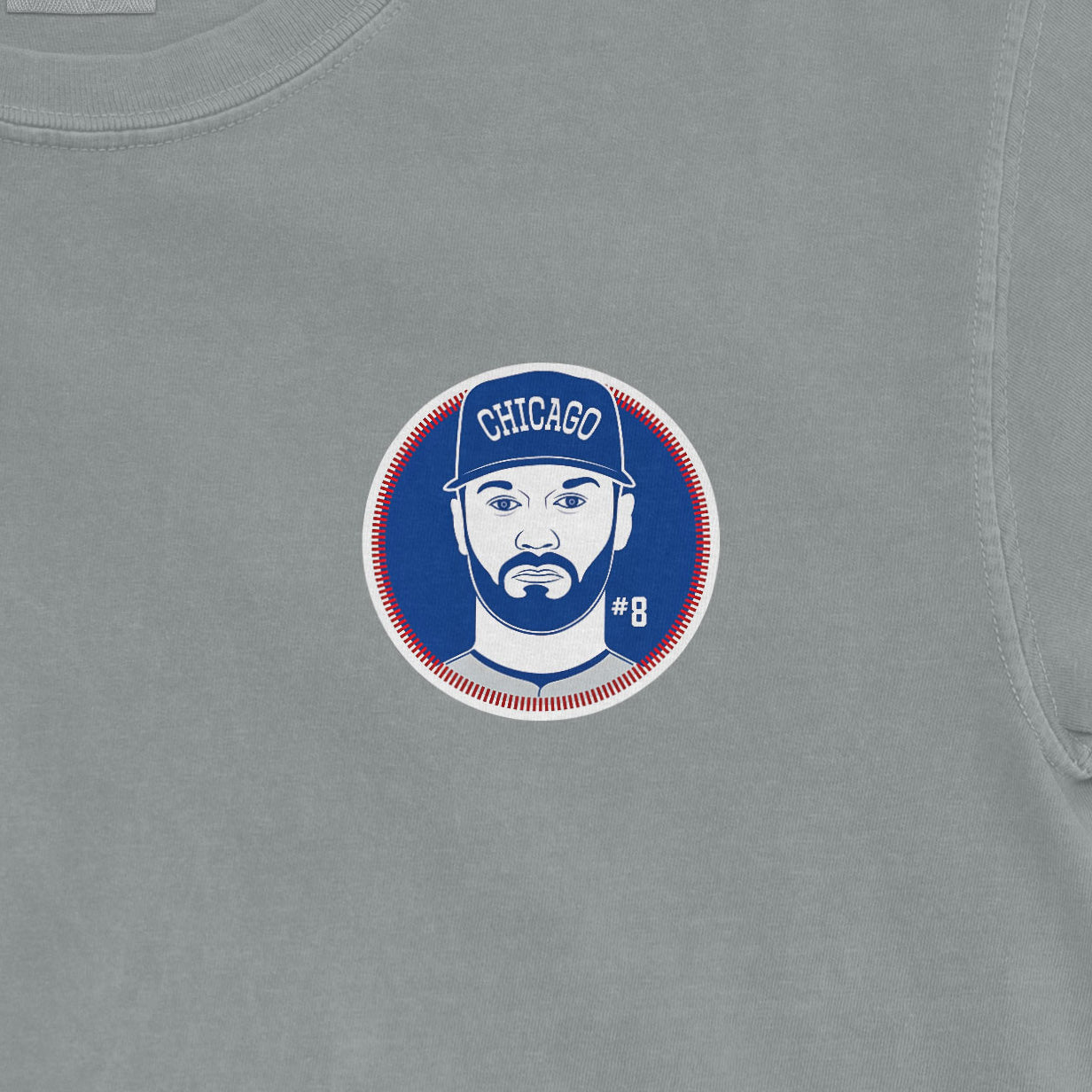Close-up of a Comfort Colors tee featuring a graphic of Ian Happ with a Chicago cap, beard, and #8 jersey number.