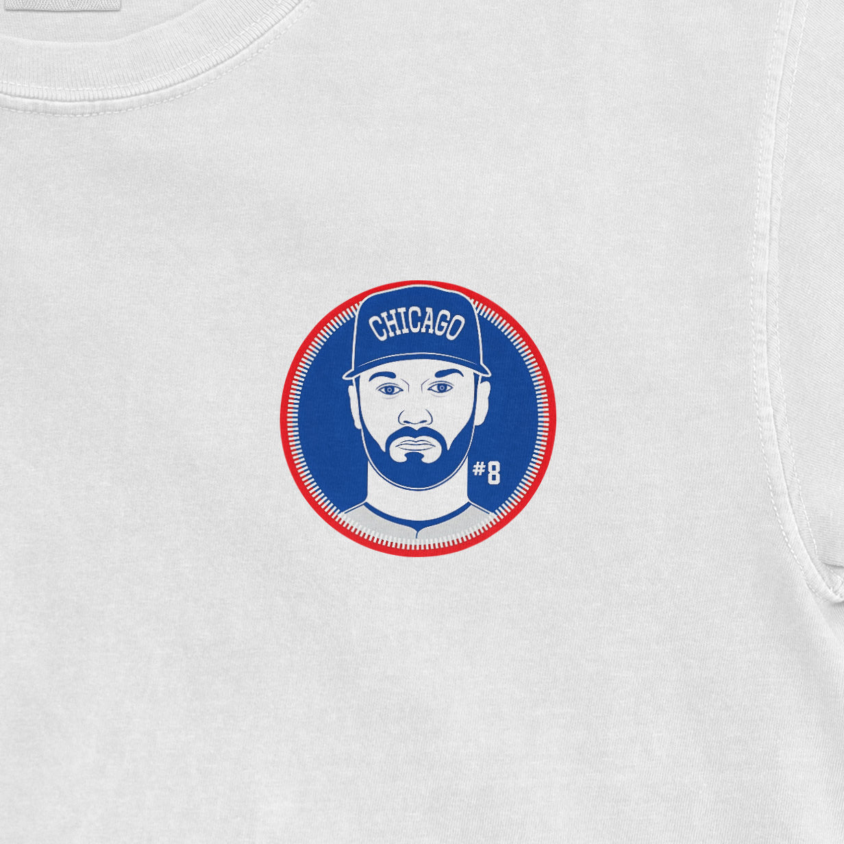 White Comfort Colors tee featuring a graphic of Ian Happ with a Chicago cap, beard, and #8, in red, white, and blue colors.