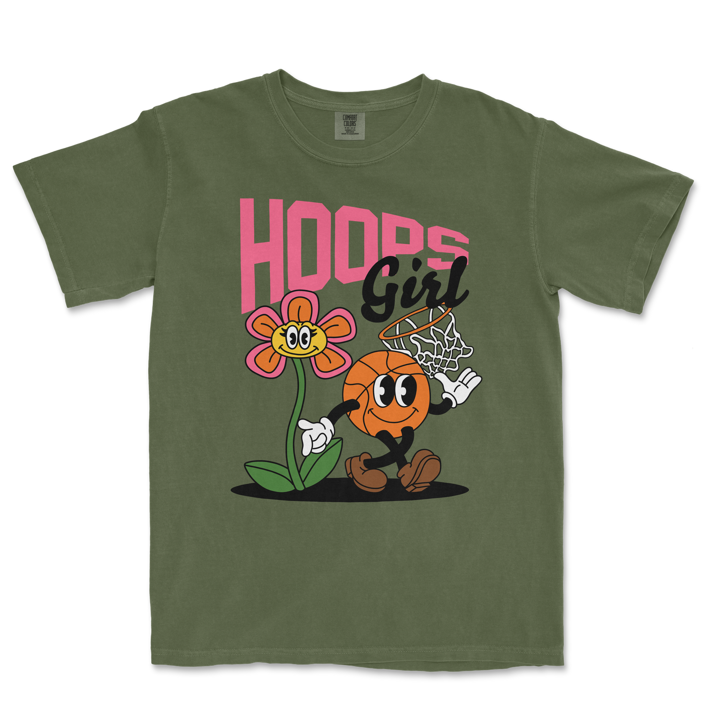 Green Comfort Colors tee featuring a cartoon basketball character playing basketball next to a smiling flower, with "Hoops Girl" text.