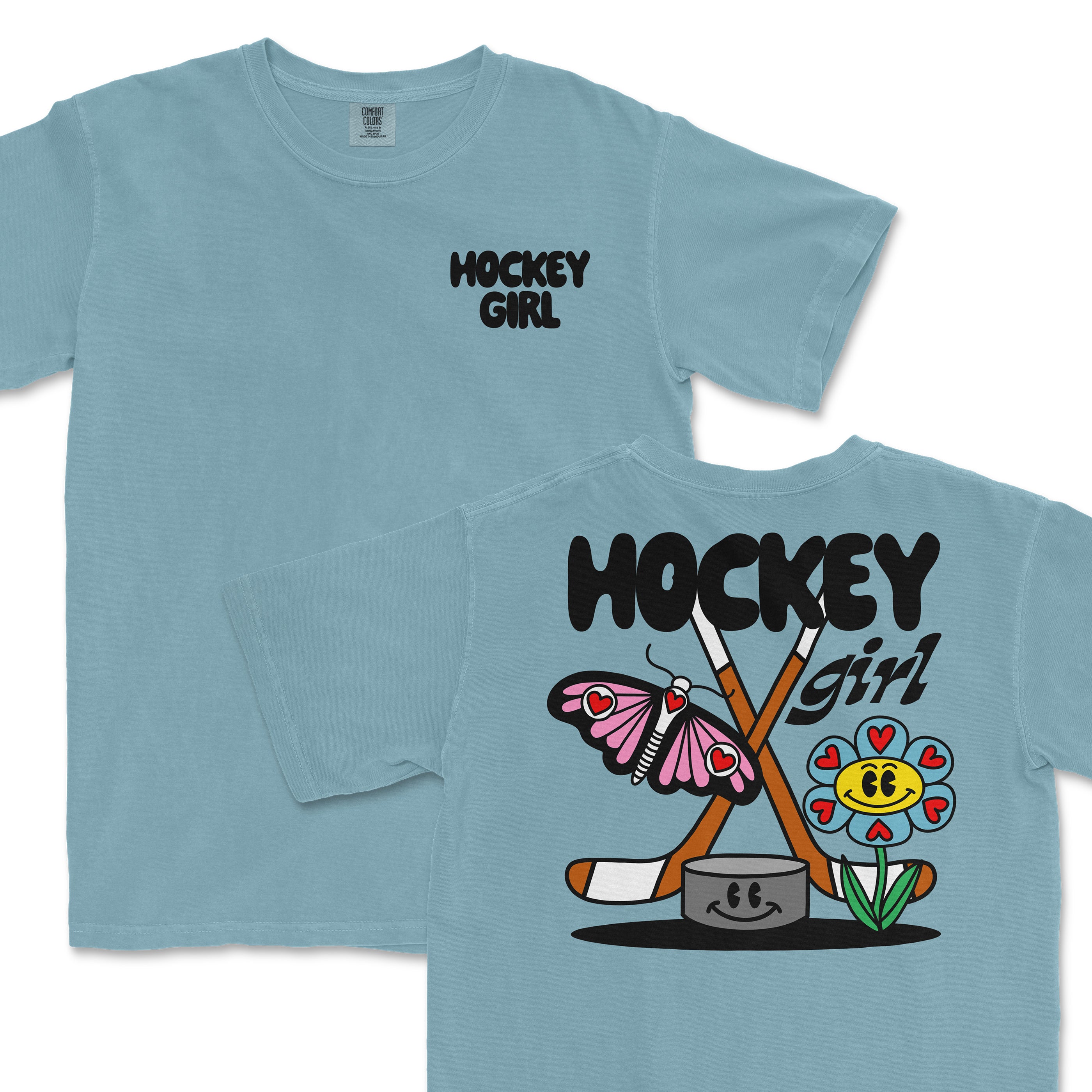 Light blue Comfort Colors tee with "Hockey Girl" text; back features hockey sticks, butterfly, flower, and smiley face design.