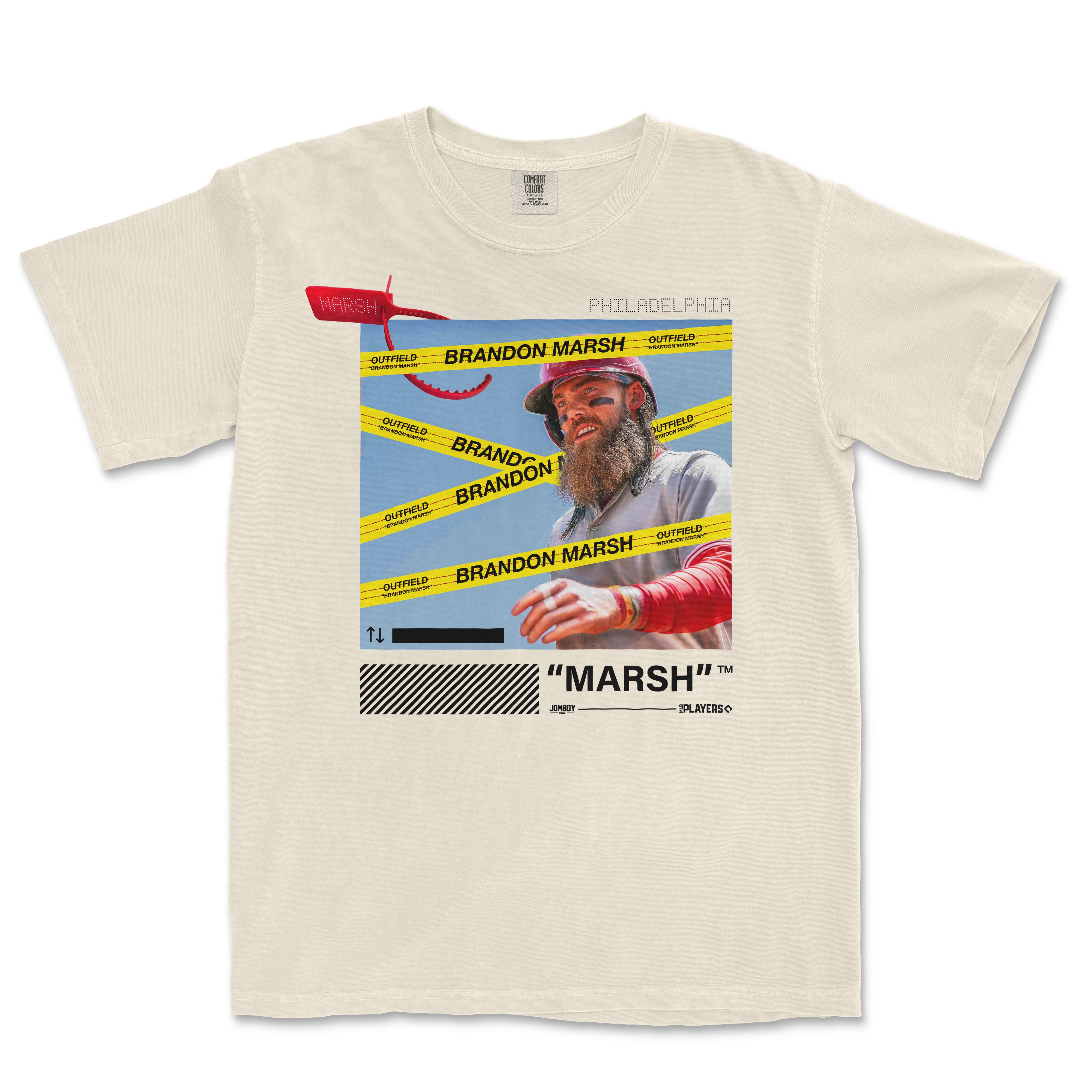Off-white Comfort Colors T-shirt featuring a graphic of Brandon Marsh with yellow "Outfield" tape, red accents, and bold text.