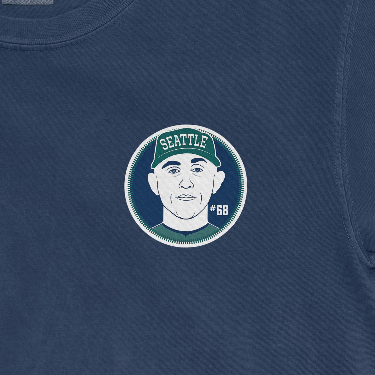 Close-up of a Comfort Colors tee featuring a graphic of George Kirby with "Seattle" and "#68" on the chest.