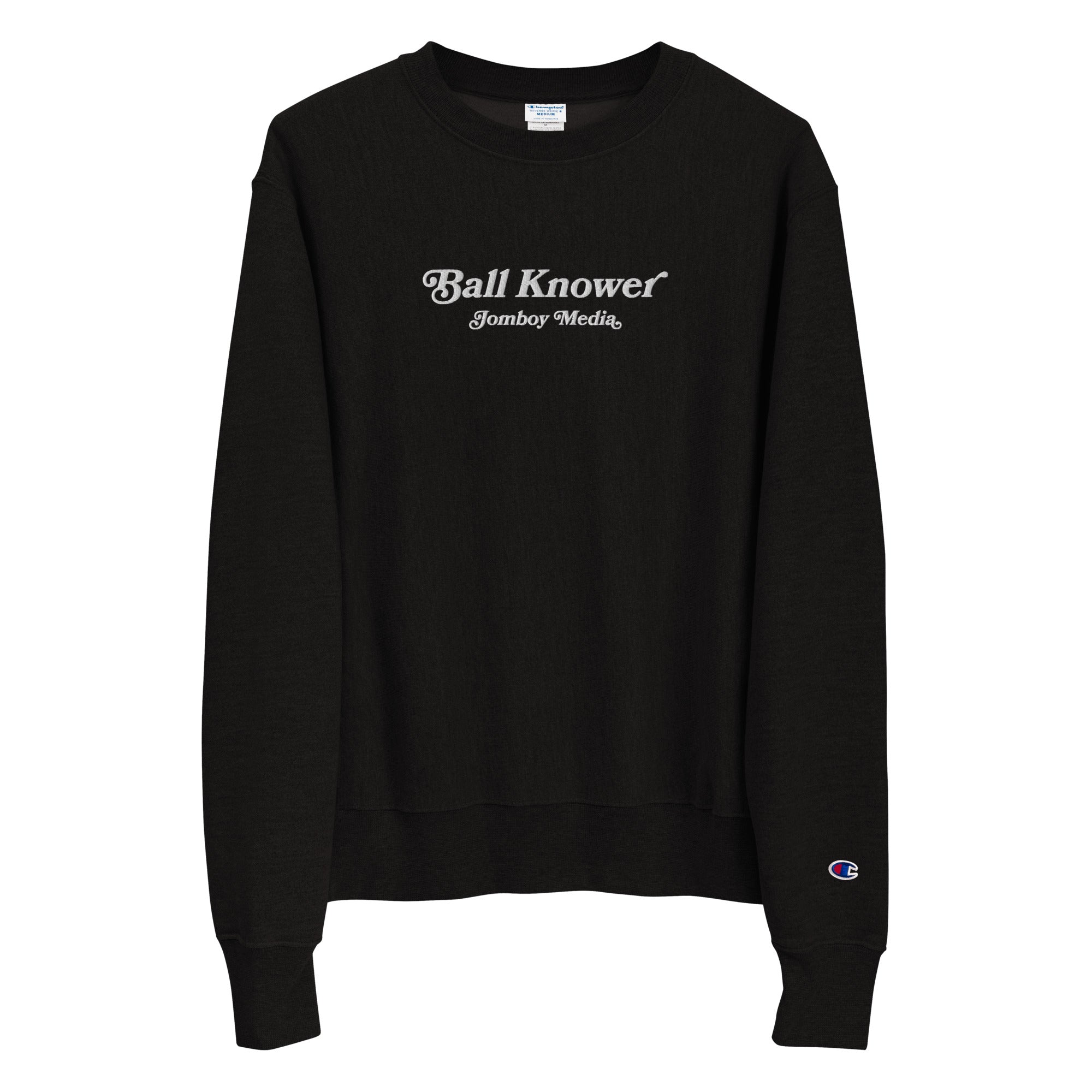 Black heavy-duty crewneck sweatshirt with embroidered "Ball Knower" and "Jomboy Media" text, featuring a small Champion logo on the sleeve.