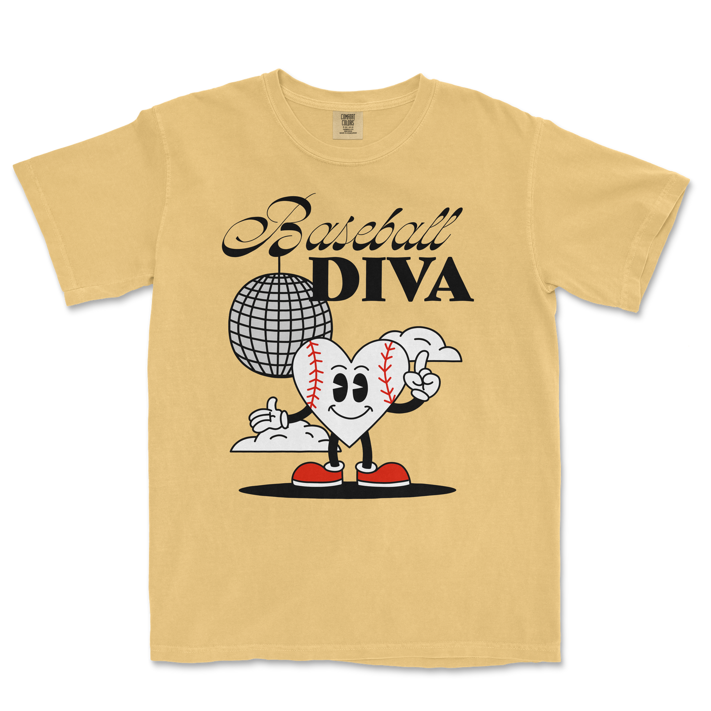 Beige Comfort Colors T-shirt featuring a cartoon heart with baseball stitches, red shoes, and a finger gun, with "Baseball Diva" text.