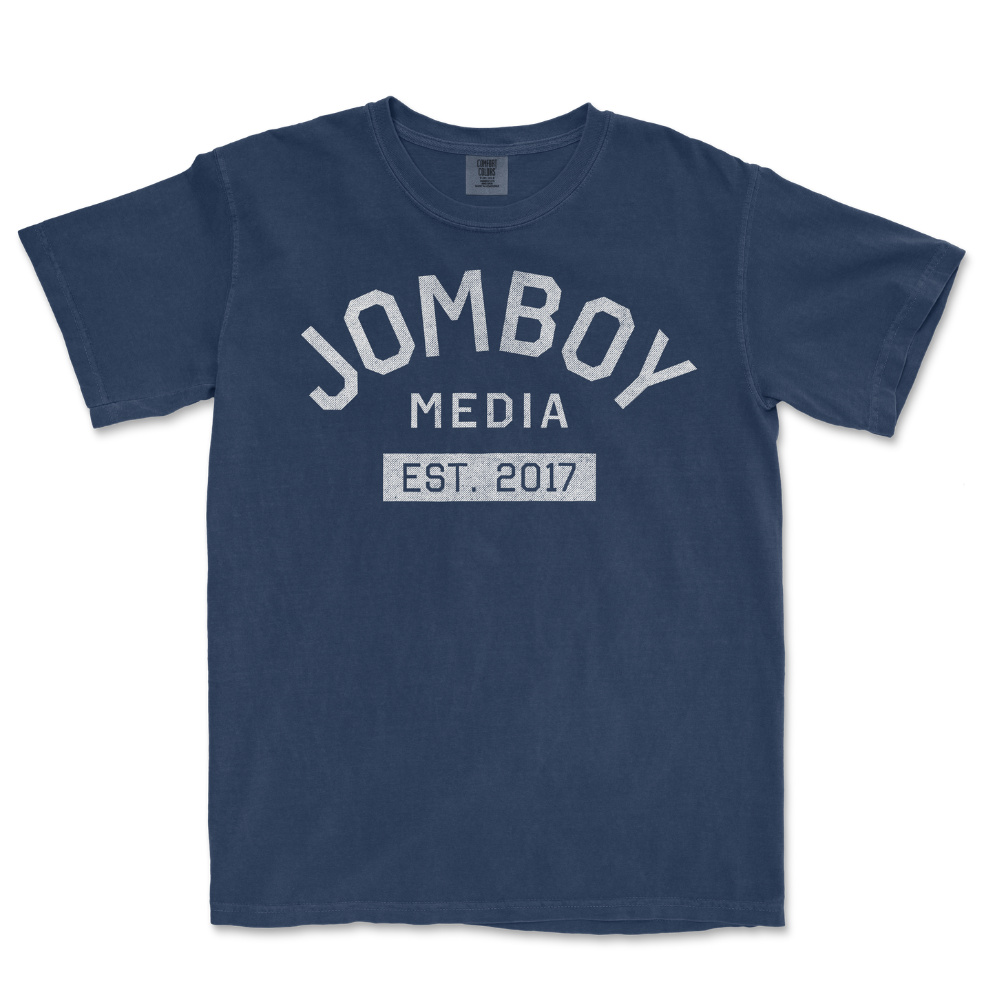 Blue Comfort Colors T-shirt with "Jomboy Media Est. 2017" printed in white, vintage-style text on the front.