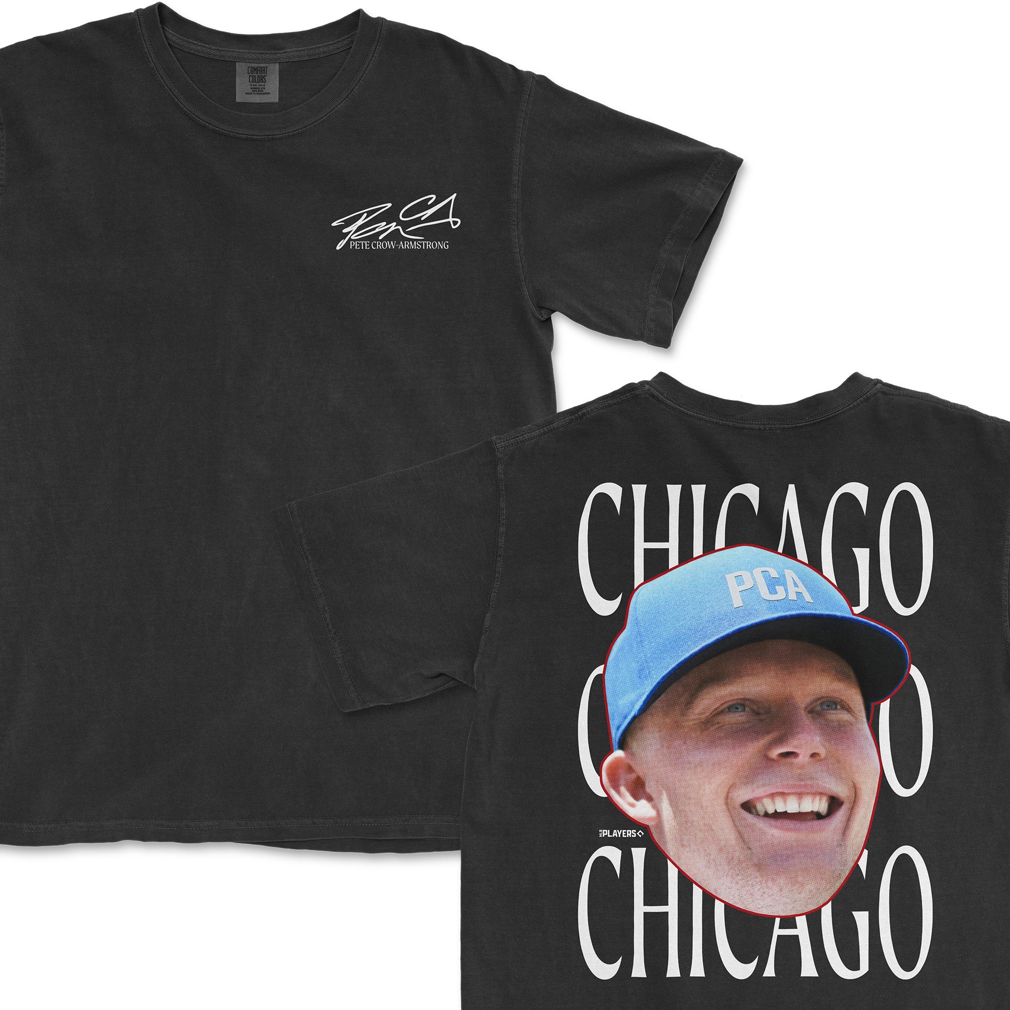 Black t-shirt featuring a large smiling face graphic and "Chicago" text, part of the PCA Get Your Head in the Game Series.