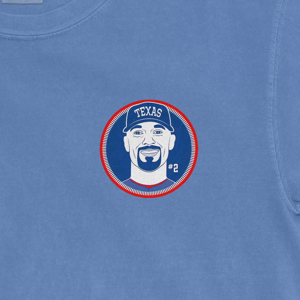 Blue Comfort Colors tee featuring a graphic of Marcus Semien's face, wearing a Texas cap, with "#2" below.