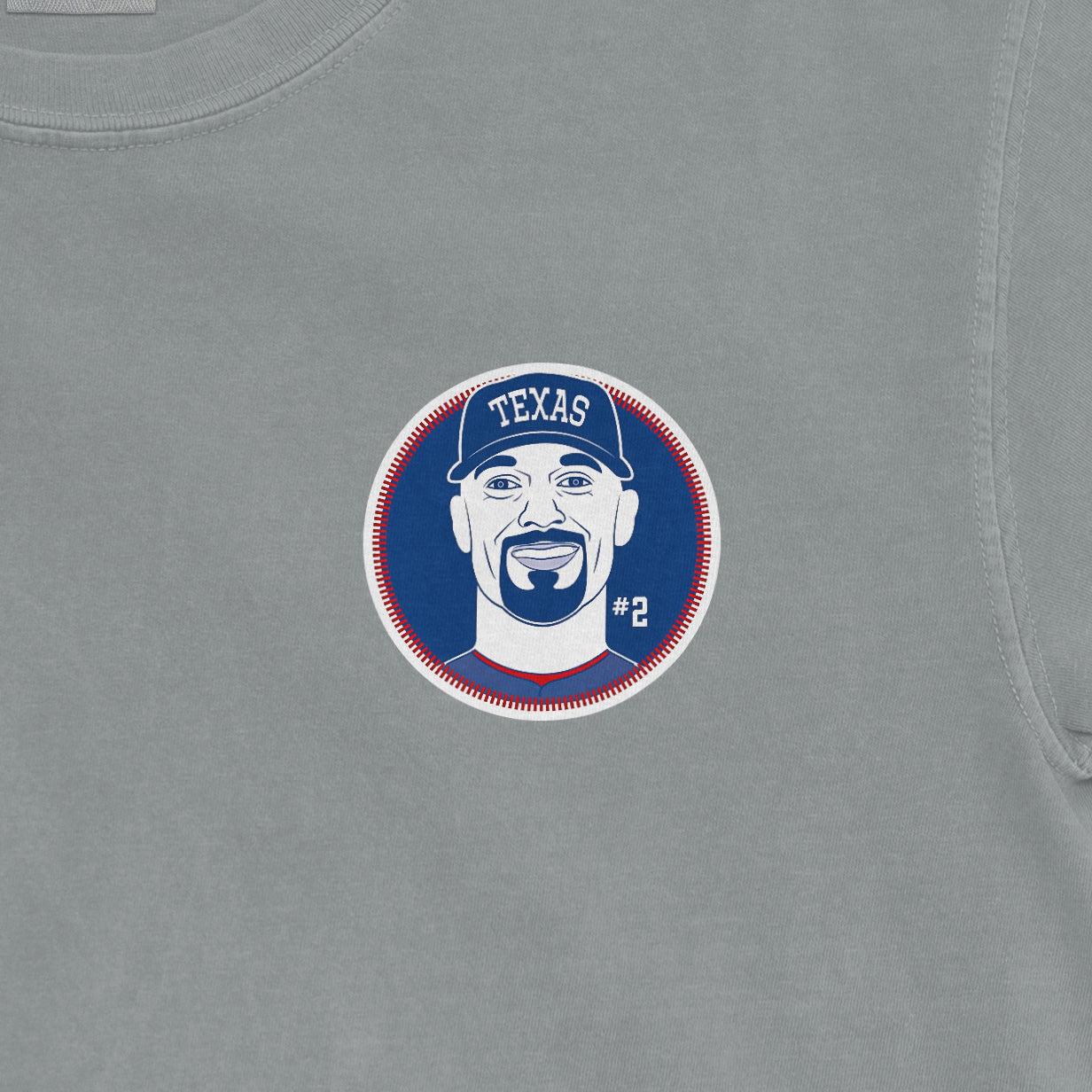 Gray Comfort Colors T-shirt featuring a Texas-themed graphic of Marcus Semien with his number 2 and a cap reading "TEXAS.