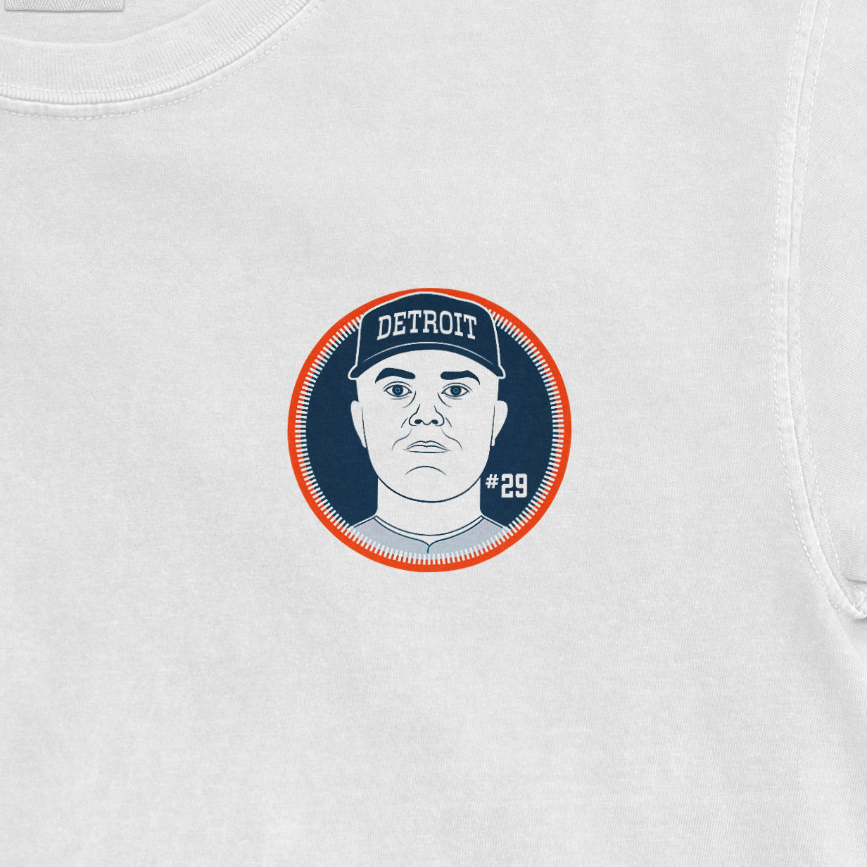 White shirt featuring a Tarik Skubal Detroit Tigers graphic shirsey with his face, cap, and jersey number 29.