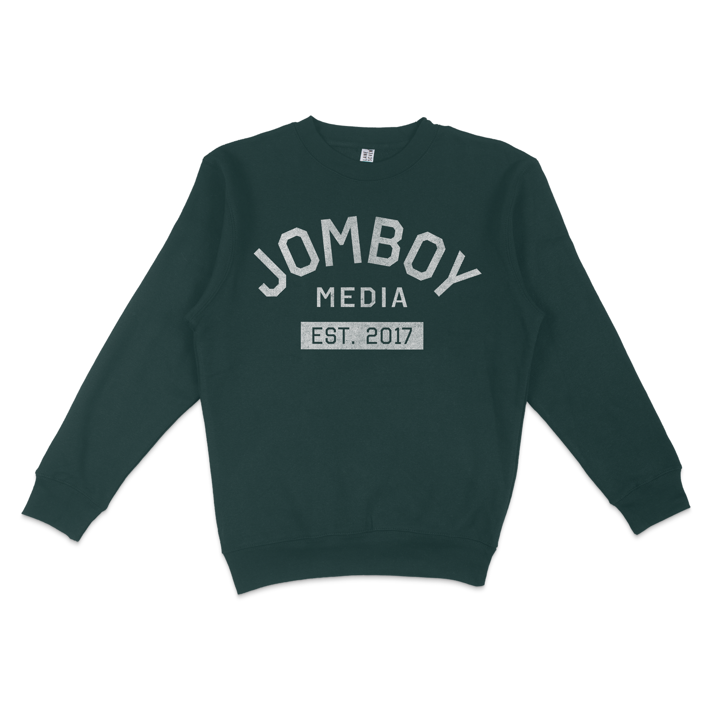 Dark green crewneck sweatshirt with "Jomboy Media Est. 2017" printed in white and gray on the front.