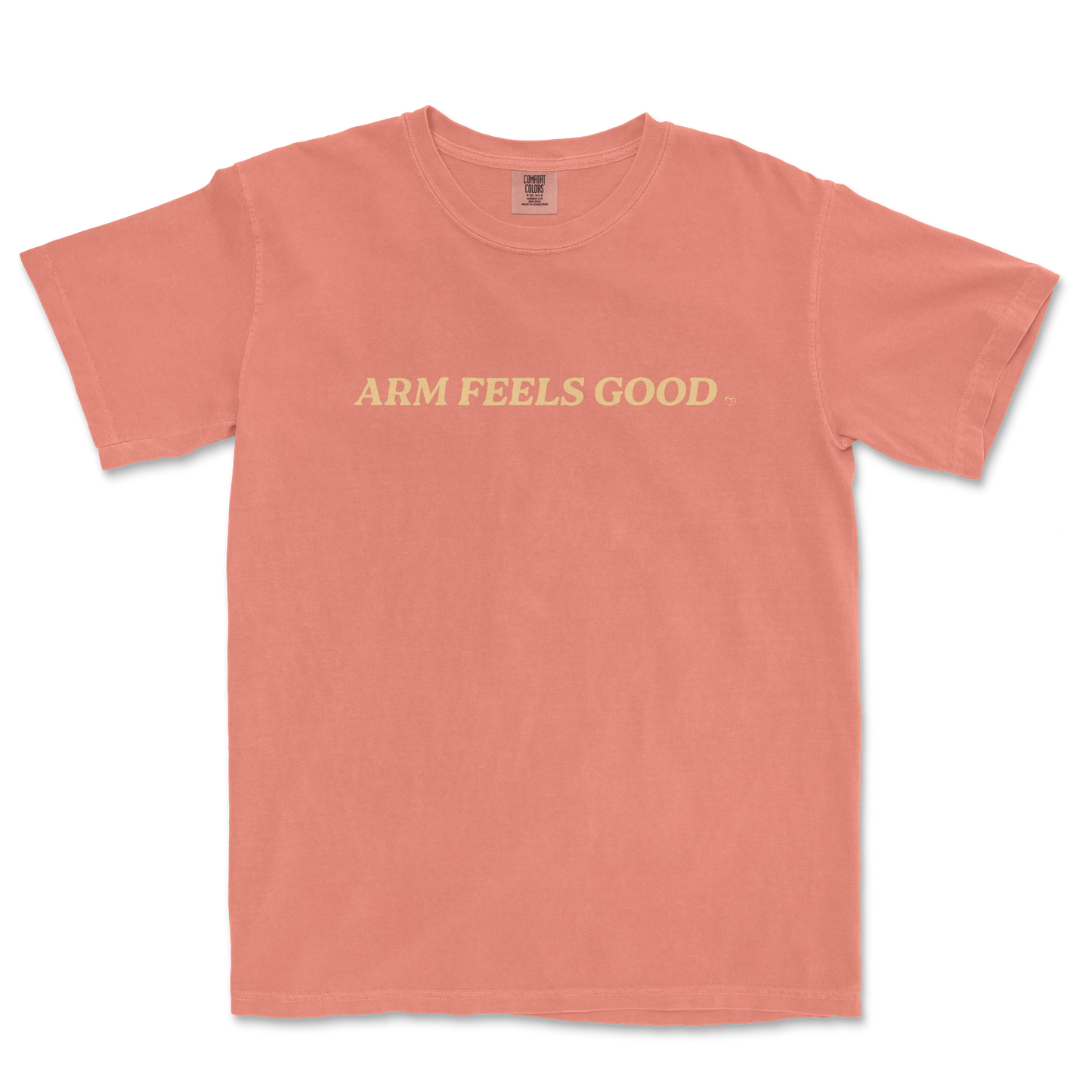 Pink Comfort Colors T-shirt with "ARM FEELS GOOD" text in cream-colored font across the front.