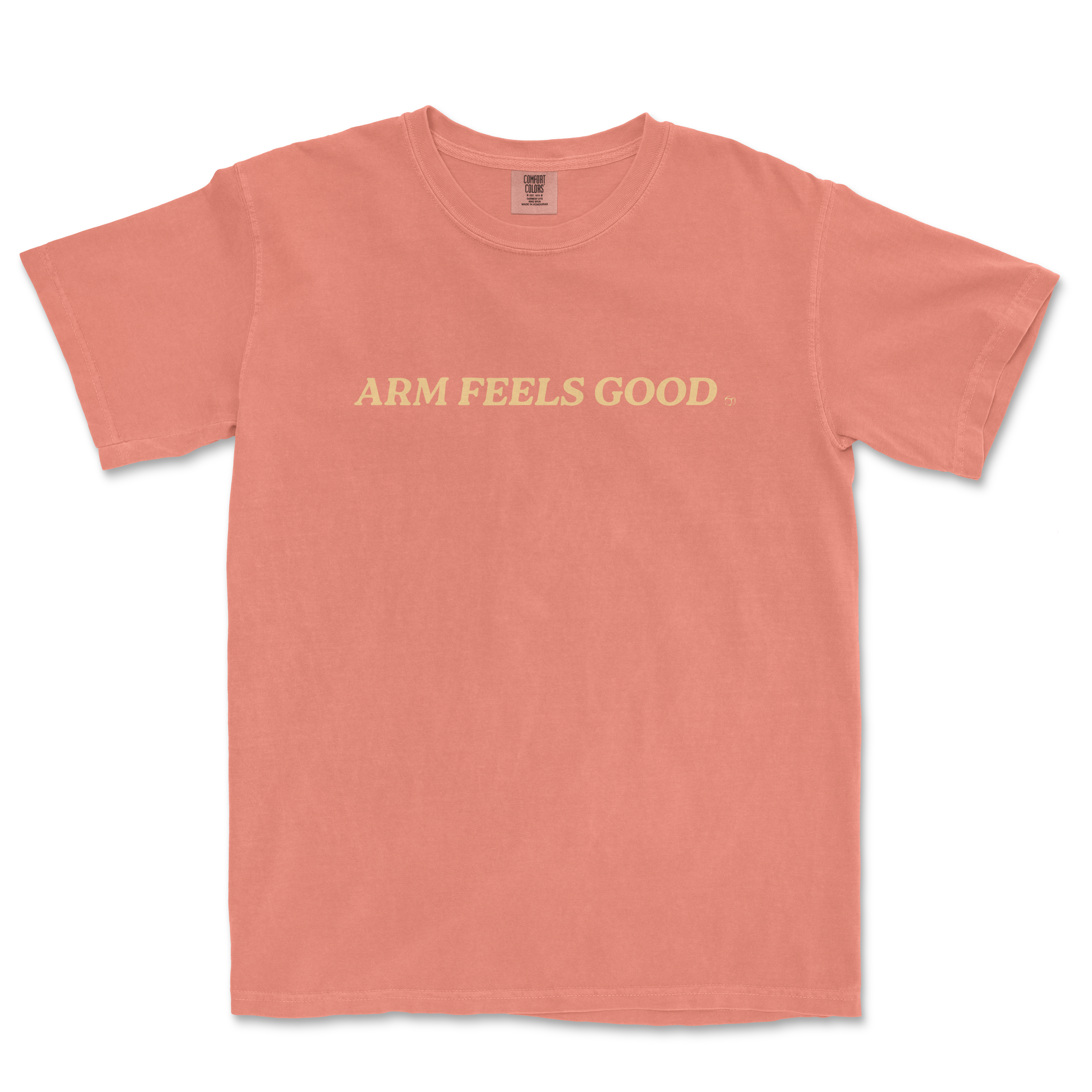 Pink Comfort Colors T-shirt with "ARM FEELS GOOD" text in cream-colored font across the front.