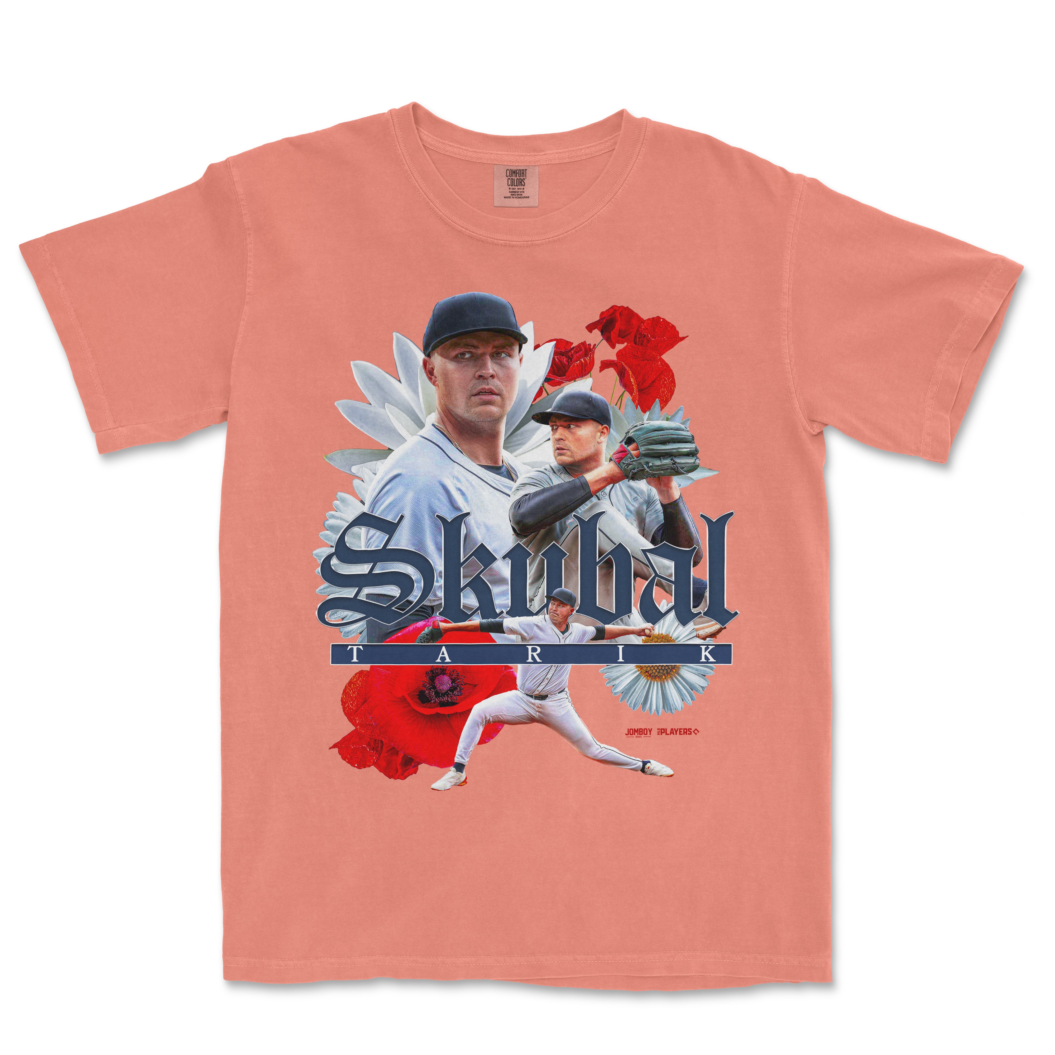 Pink T-shirt featuring a collage of baseball players, flowers, and the text "Skubal" and "TARIK" in bold, stylized font.