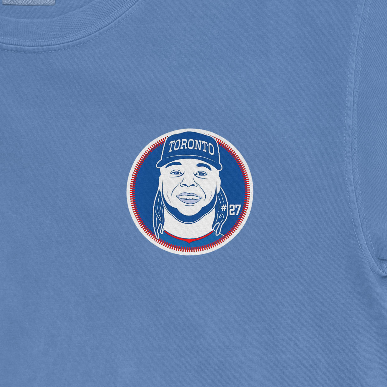 Blue Vladimir Guerrero Jr. Toronto baseball shirsey featuring a graphic of Guerrero with jersey number 27.