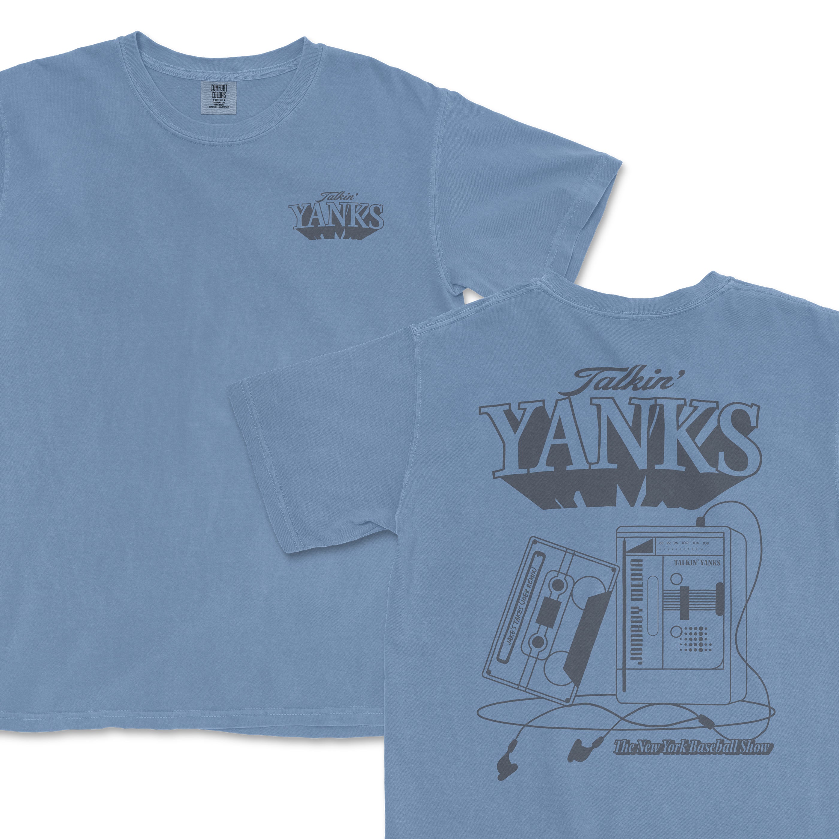 Blue T-shirt featuring "Talkin' Yanks" logo and graphic of a cassette player with headphones, celebrating baseball and music.