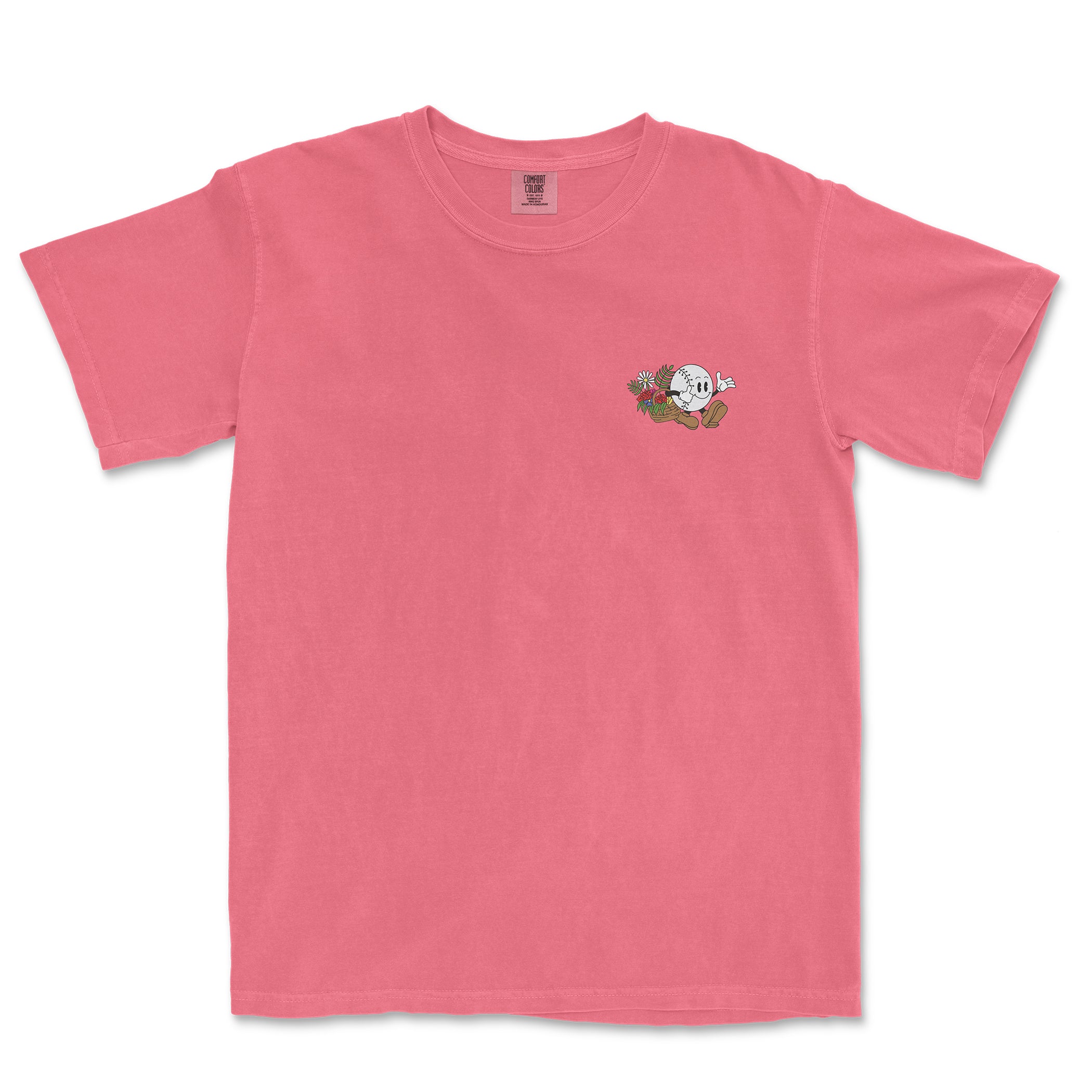 Pink Comfort Colors tee featuring a small baseball girl graphic with flowers on the chest.