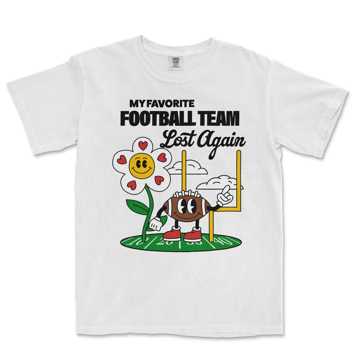 White Comfort Colors T-shirt with a cartoon flower and football character, featuring the text "My Favorite Football Team Lost Again.