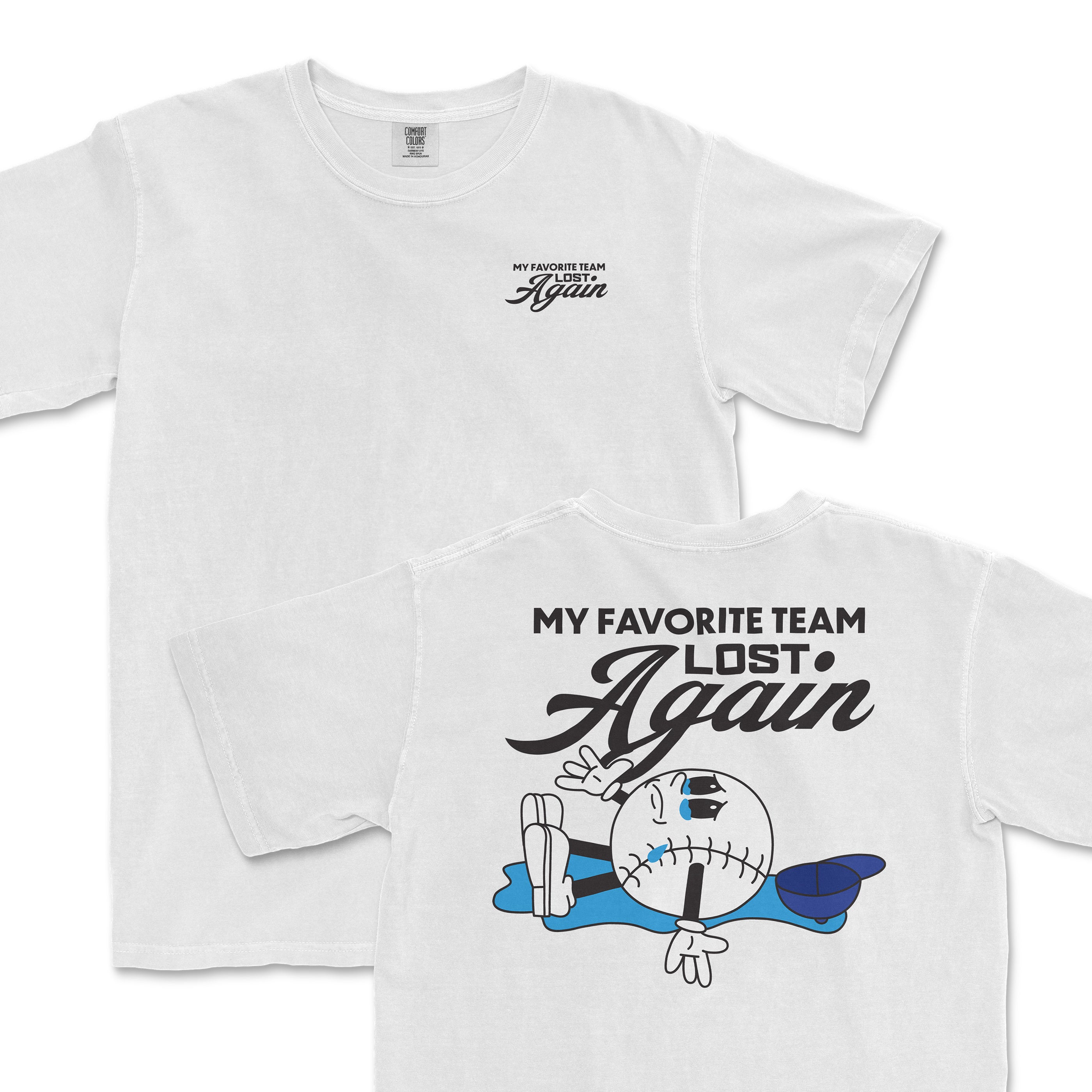 White t-shirt featuring a cartoon baseball character lounging with the text "My Favorite Team Lost Again" on the back.
