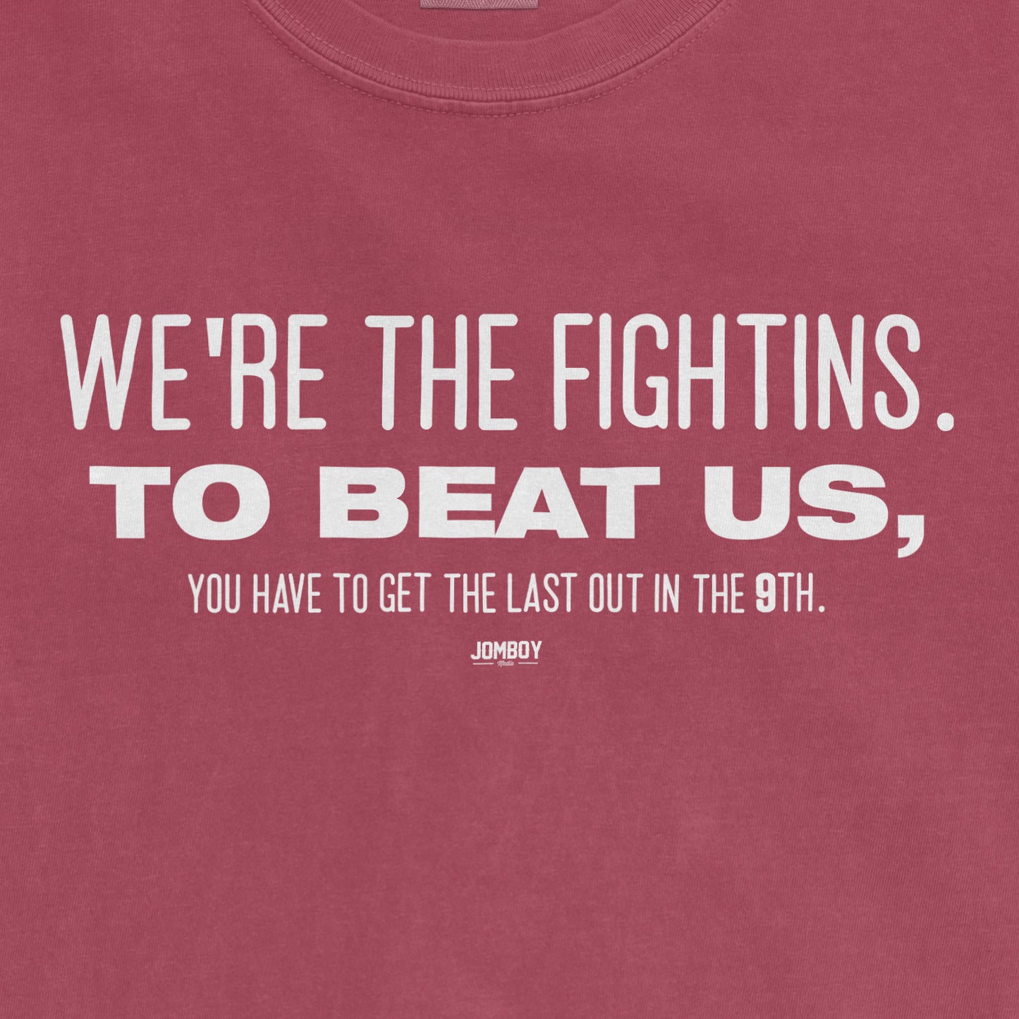 Pink T-shirt with white text: "We're the fightins. To beat us, you have to get the last out in the 9th.