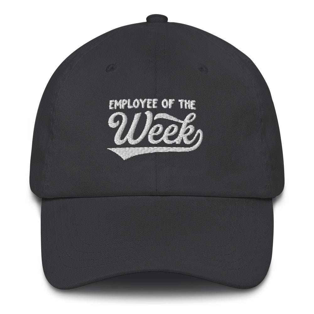 Black dad hat with white embroidered text reading "Employee Of The Week" on the front.