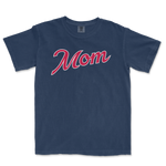 Comfort Colors navy T-shirt with "Mom" written in large, cursive pink and white lettering, celebrating Atlanta baseball moms.
