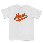 White Comfort Colors T-shirt with "Mom" in orange script and a swoosh underline, celebrating Baltimore baseball moms.