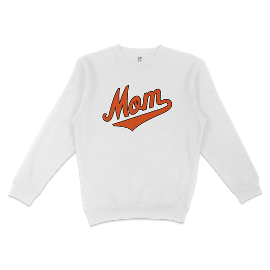White crewneck sweatshirt with "Mom" in bold, orange, stylized text on the front, designed for Baltimore baseball moms.