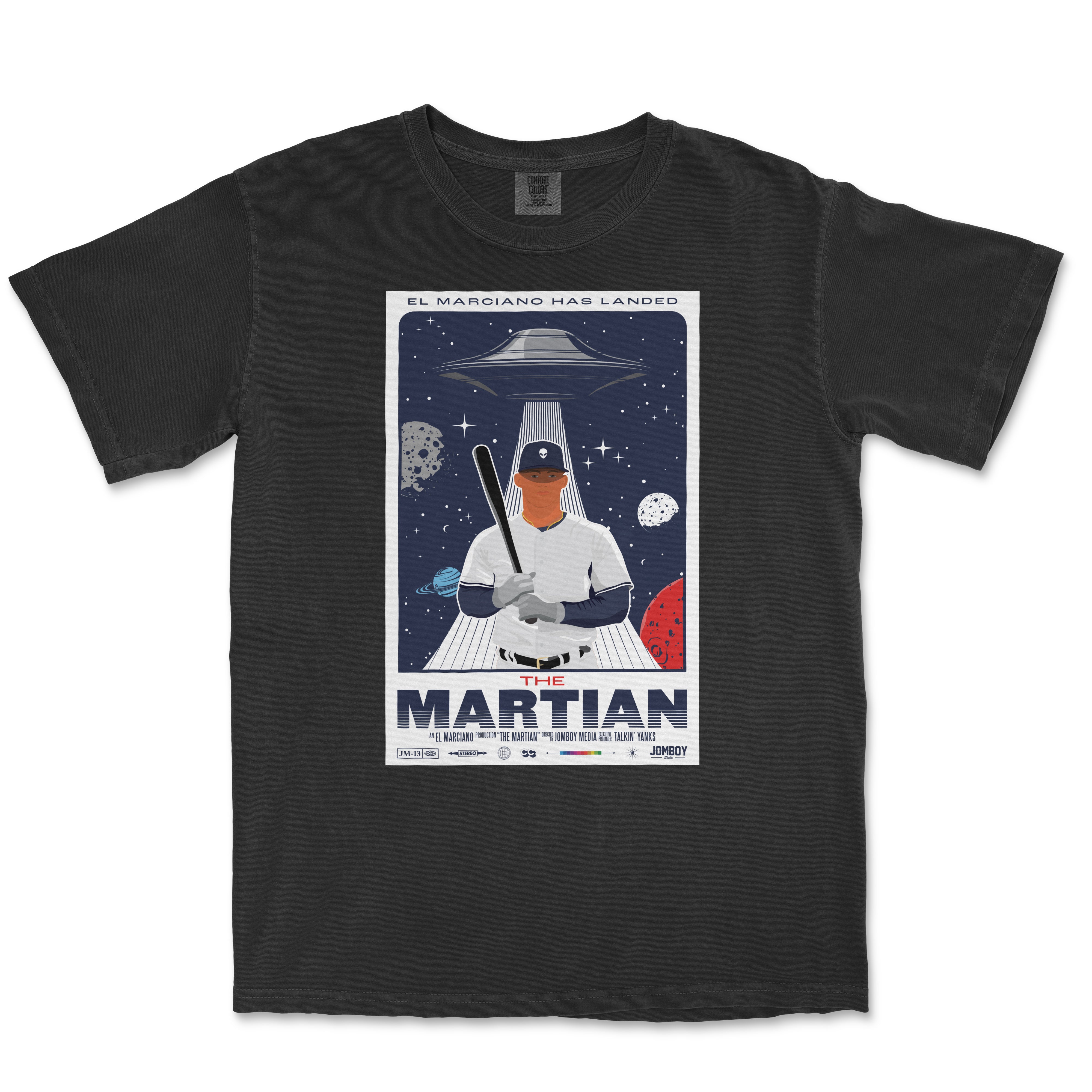 T-shirt featuring a space-themed design with a baseball player holding a bat, a UFO above, and planets in the background, titled "The Martian.