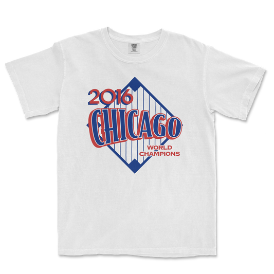 White Comfort Colors T-shirt featuring a 2016 Chicago World Champions graphic with a blue and red design of the city skyline and text.