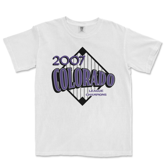 White Comfort Colors tee featuring a 2007 Colorado league champions graphic with purple and black design elements.