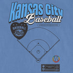 Blue Comfort Colors vintage tee featuring a Kansas City Baseball Pride design with a baseball field diagram, rainbow-colored baseball, and text.