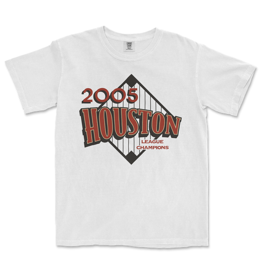 White Comfort Colors T-shirt featuring a Houston 2005 league champions graphic with a bridge illustration and bold red and brown text.