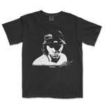 Black Comfort Colors T-shirt featuring a monochrome graphic of Jazz Chisholm wearing a helmet, with "HUH?" text and signature.