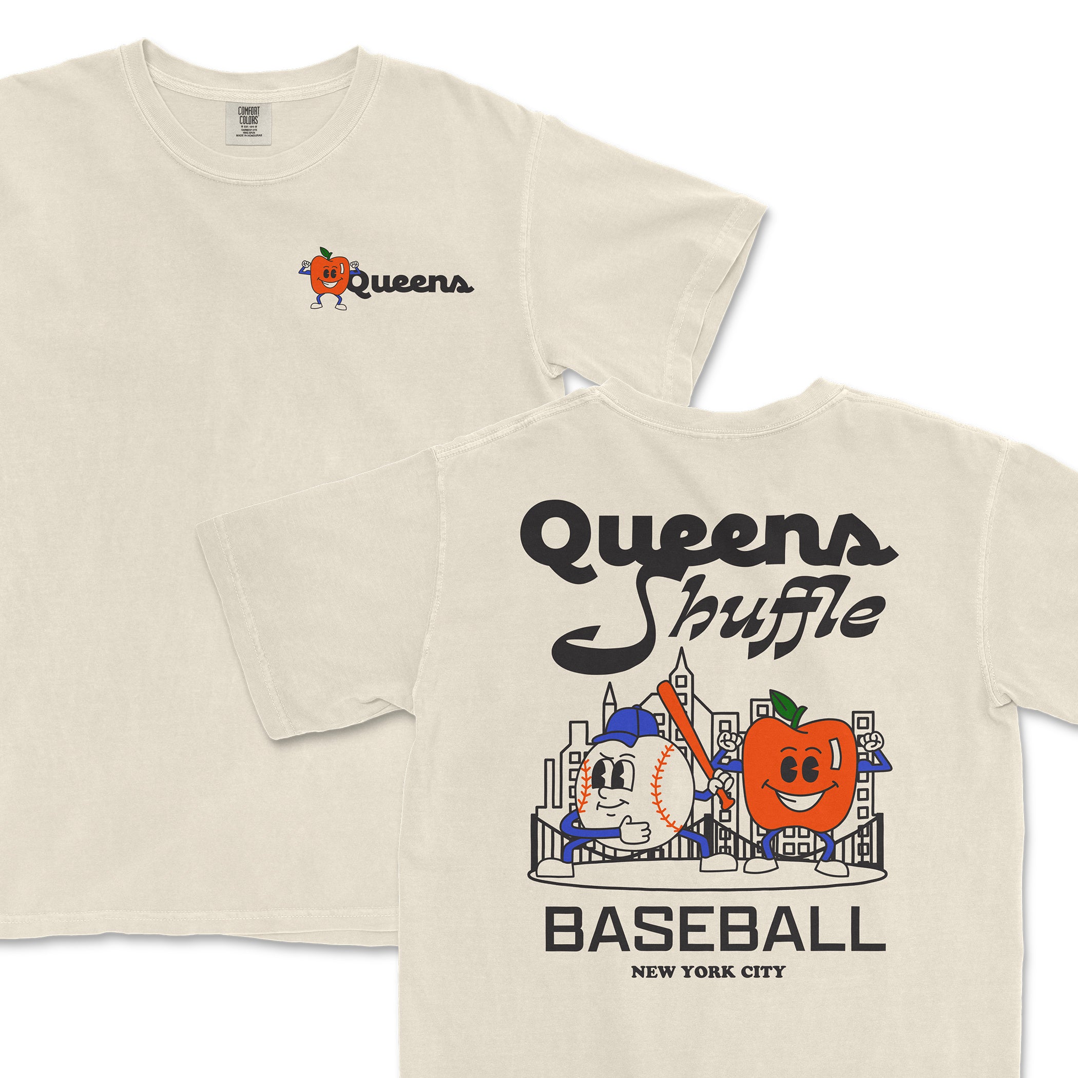 Cream-colored T-shirt featuring a cartoon orange with a green leaf and a baseball with a face, promoting Queens Shuffle NYC Baseball in New York City.
