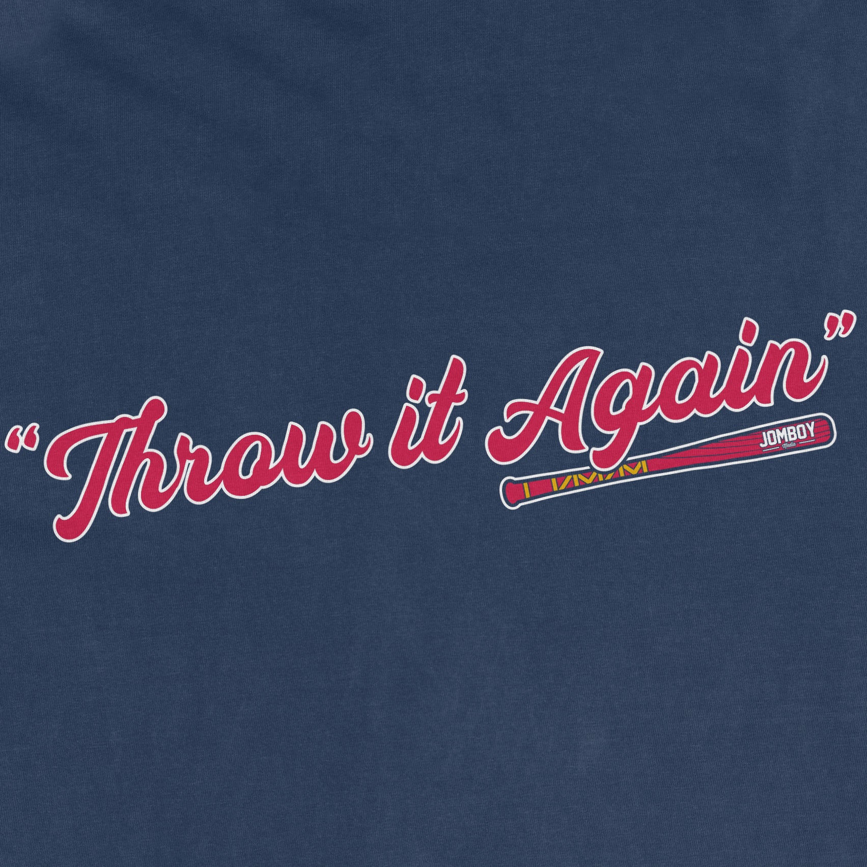 Close-up of a blue fabric with the phrase "Throw it Again" in red cursive text and a colorful baseball bat graphic.